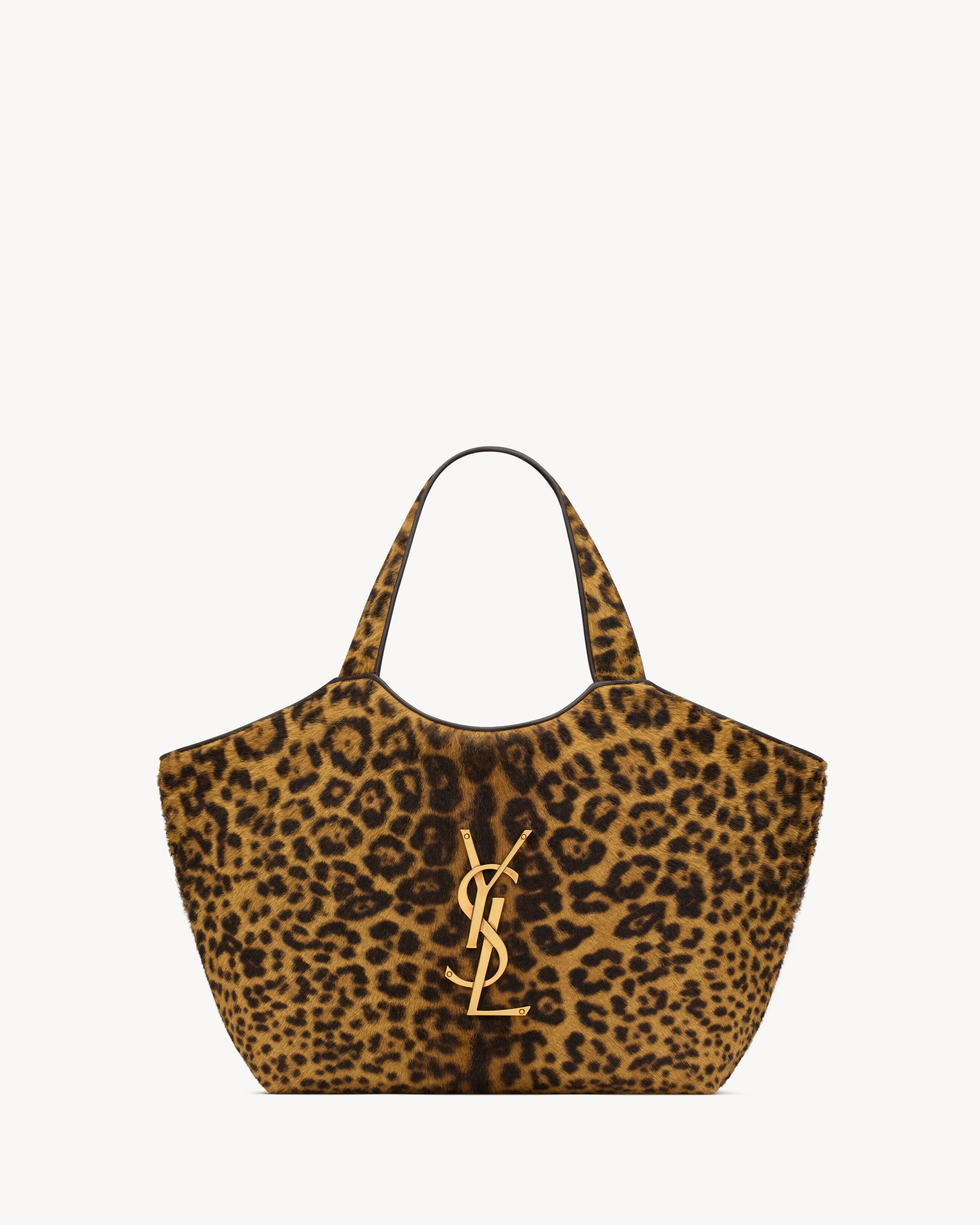 The iconic ICARE in a versatile MEDIUM size. This modern bag in leopard-print pony hair leather a... | Saint Laurent Inc. (Global)