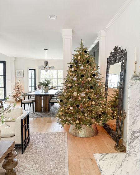 Christmas tree, living room & dining room views 🎄 Loving this gold tree collar this year!

#LTKfindsunder100 #LTKHoliday #LTKhome