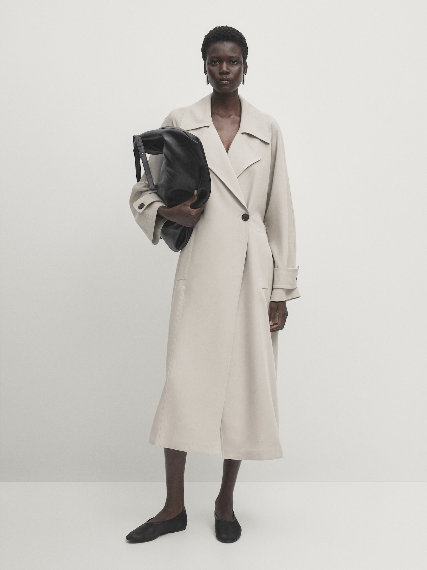 Loose-fitting trench coat with belt | Massimo Dutti US