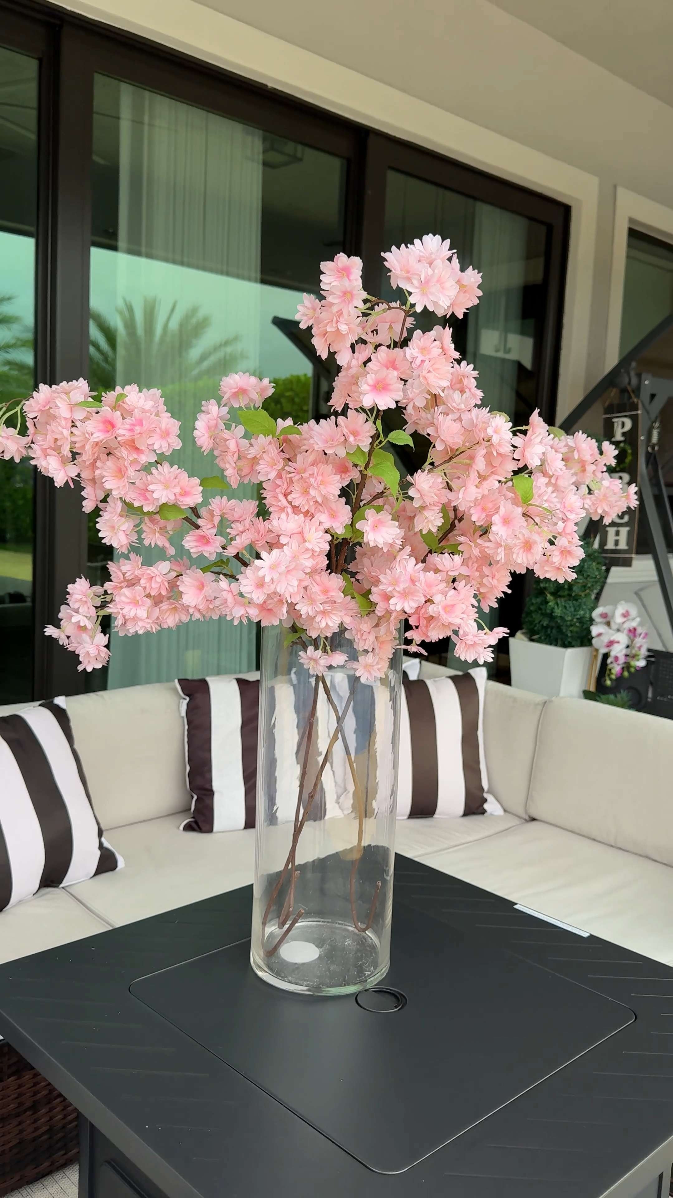 🌸 Outdoor Bloom Vibes 🌸 Nothing says effortless elegance like cherry blossoms in a tall glass vase. Perfect for patios, entryways, or bringing a soft pop of pink to any space. Shop the full look below ✨

#LTKhome #LTKdecor #CherryBlossomDecor #OutdoorStyling #HomeInspo #LTKspring 

 #LTKActive #LTKU #LTKHome
