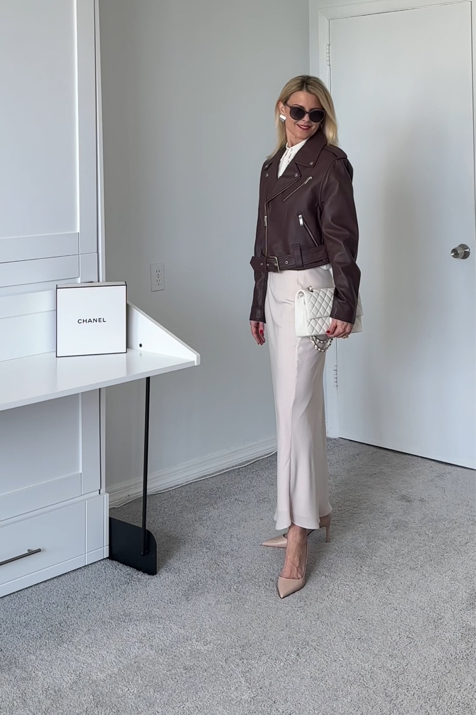 The exact skirt I'm wearing from Abercrombie is the silk one that is being discontinued and has very limited availability.   I linked the satin one that is replacing it.    

The jacket is in Australian sizes.   I typically wear an XS 0/2.   Im wear long an Australian 8.   6 is probably my true size but I wanted a slightly larger fit.   

#LTKSeasonal #LTKover40 #LTKparties