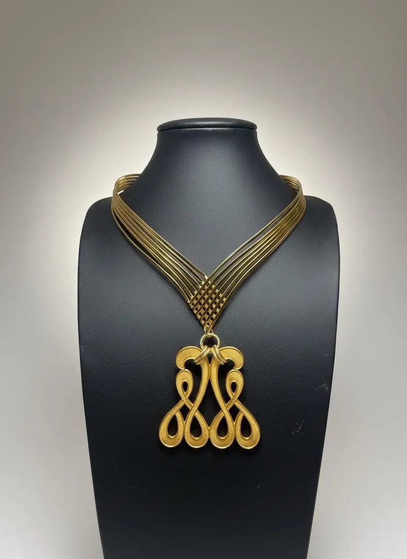 TRACEY-1950’s Miriam Haskell brass stamp paired with 1960’s gold Art Deco choker. | Etsy (US)