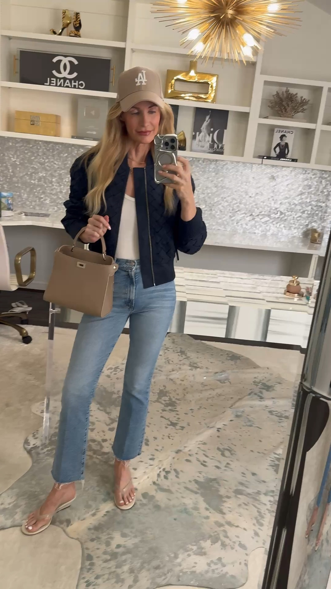 Casual outfit idea with a chic navy faux suede bomber jacket, trending wedge flip flops, and flattering Mother jeans for an easy everyday look that still feels elevated and put-together. I’m wearing an XS jacket and size 24 jeans, both fit TTS. 

 #LTKootd #LTKSeasonal #LTKOver40