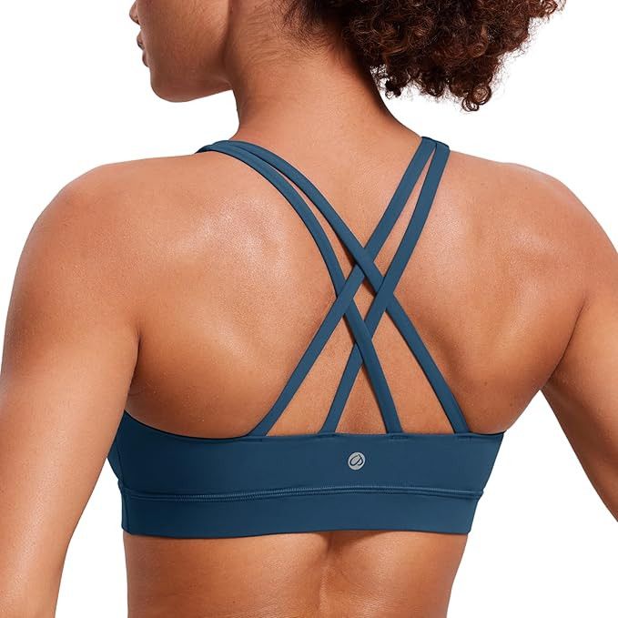CRZ YOGA Naked Feeling Strappy Padded Sports Bras for Women - Fitness Workout Top Criss Cross Bac... | Amazon (US)