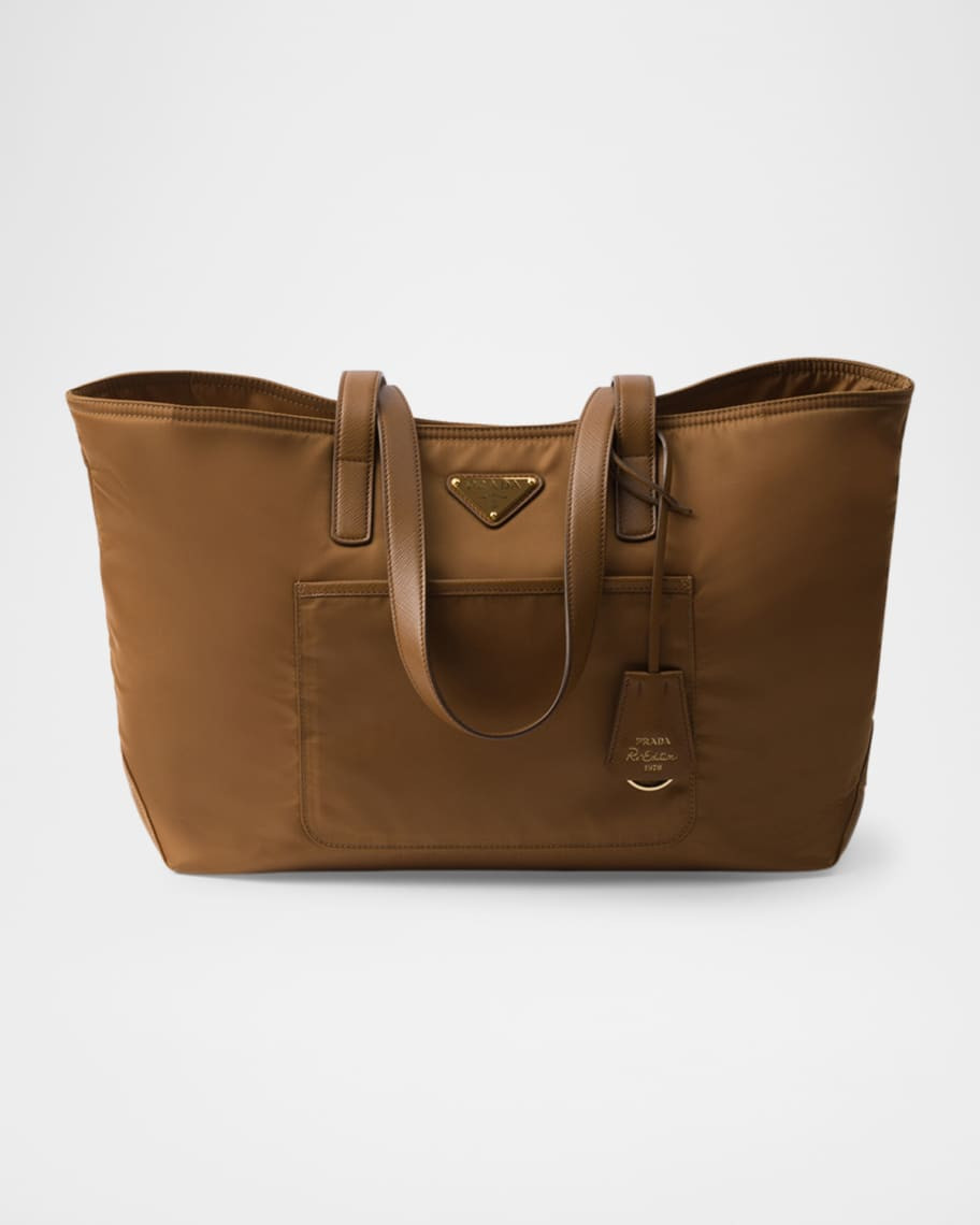 PradaHandbagsPrada TotesTotesPradaRe-Edition 1978 Re-Nylon Tote Bag$2,100Starting at $73/mo or 0%... | Neiman Marcus