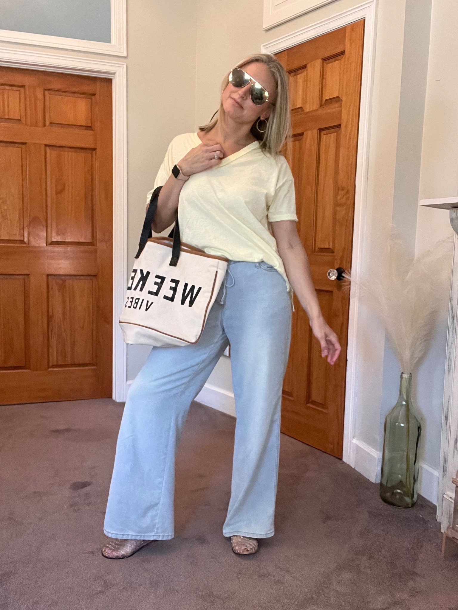 Who is ready for the weekend?? 
This outfit feels so effortless because it’s so comfy but styled just right. Drawstring wide leg denim, jellies, an oversized T and a toe bag make it weekend ready. 
Size medium in jeans, XXS in T, size 6 in jellies (size down)

#LTKmomlife #LTKOver40 #LTKootd