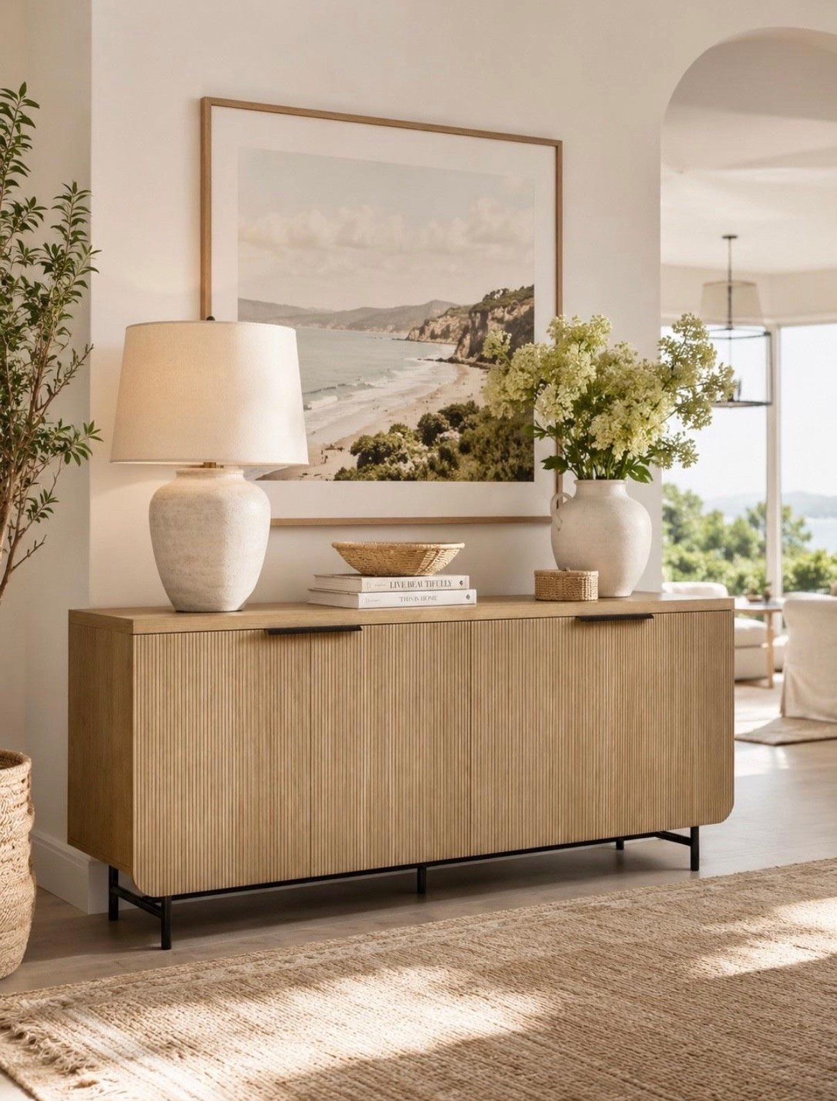 Decor Steal ✨ on this beautiful grooved sideboard with a ton of storage! 

Also comes in Black + Dark Walnut! 

Sideboard, storage cabinet, entryway cabinet, wayfair sale