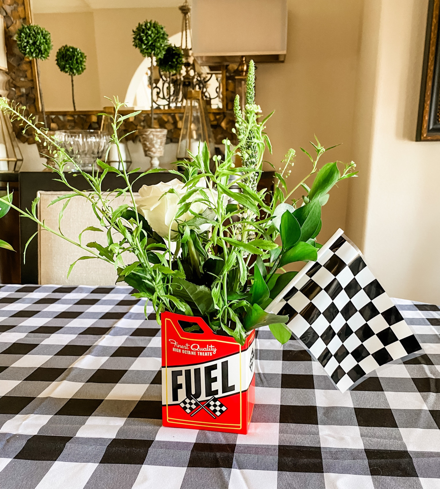 Race car popcorn containers turned into flower vases. This was a great way to use up our leftover food containers! 

#LTKkids #LTKfamily #LTKparties