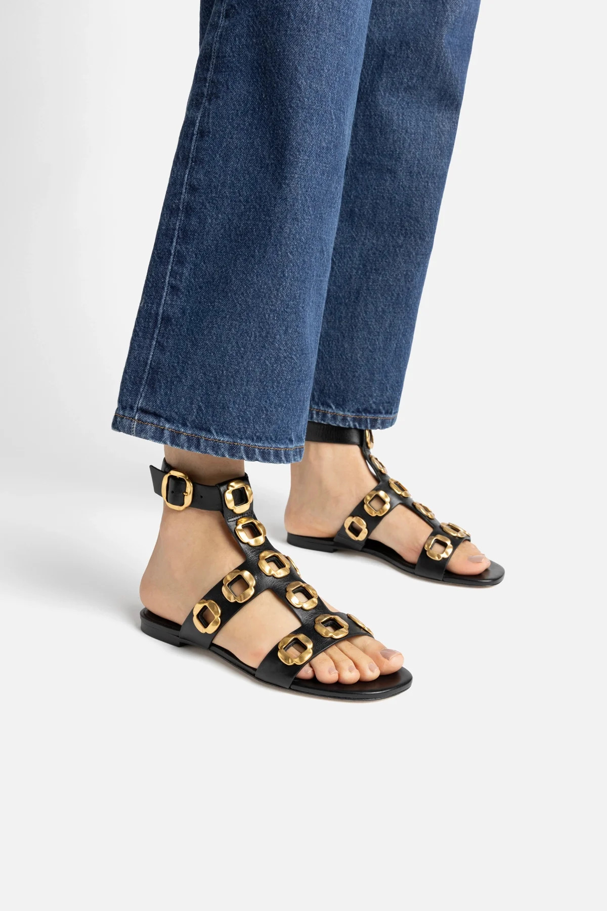 Milan Gladiator Flat In Black Leather | Larroude