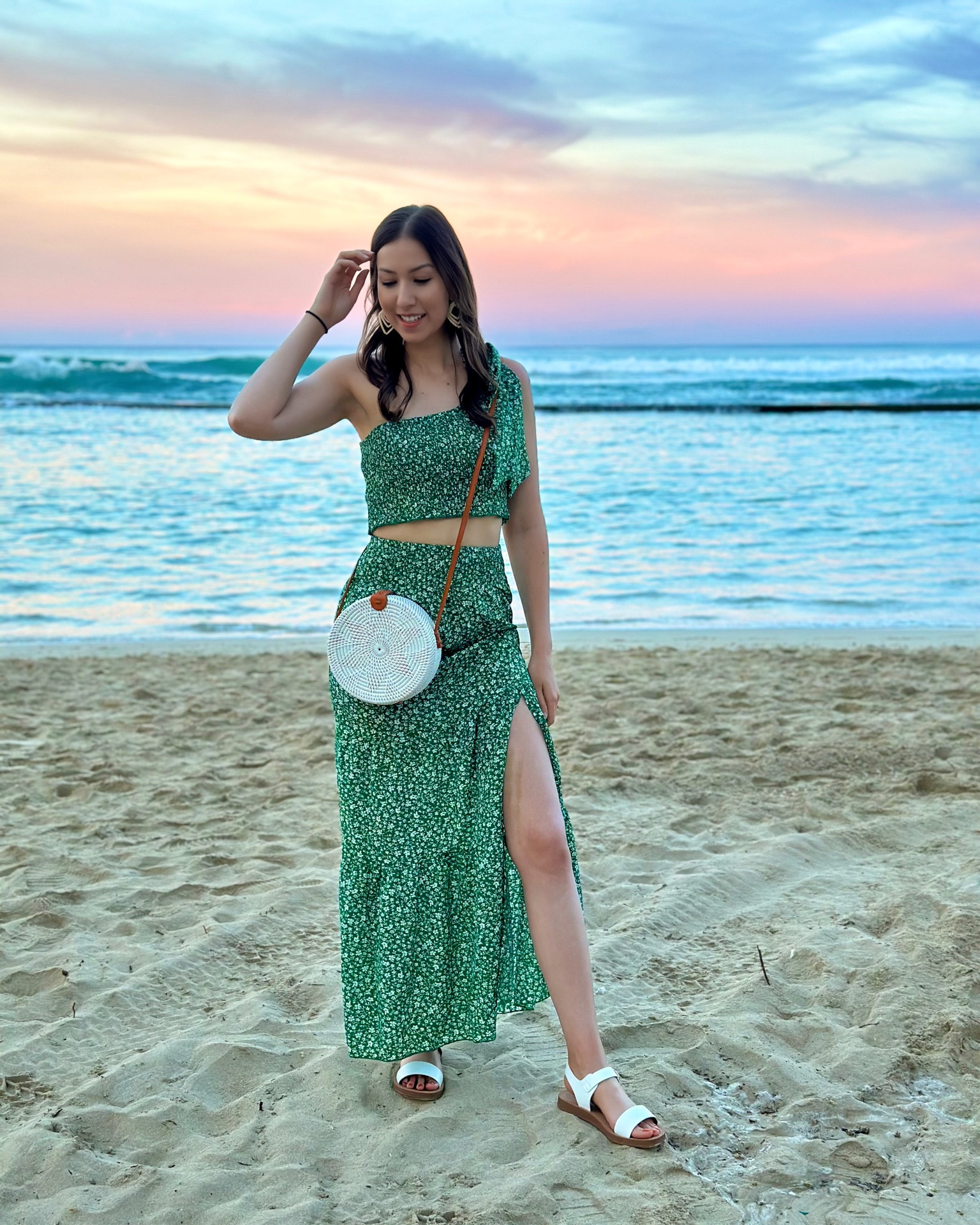 The perfect beach vacay outfit. This green two piece set is from Amazon. Love the side slit & one shoulder tie details. Paired with rattan earrings and purse. 🤍

Follow @jenniferxherron for more inspiration ✨

#LTKtravel #LTKunder100 #LTKunder50