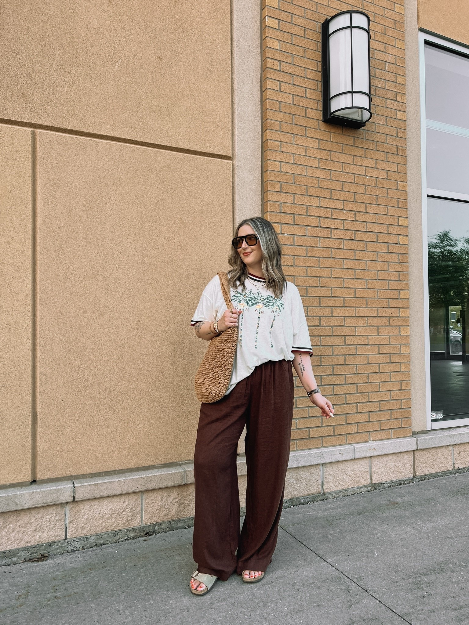 Comfy casual summer outfit! Wearing my usual size L in the graphic tee and L tall in the linen pants (Canadian pants link under “similar products”). Sunnies and straw bag are Amazon finds! Birkenstocks fit TTS

#LTKsummer #LTKmidsize #LTKsale