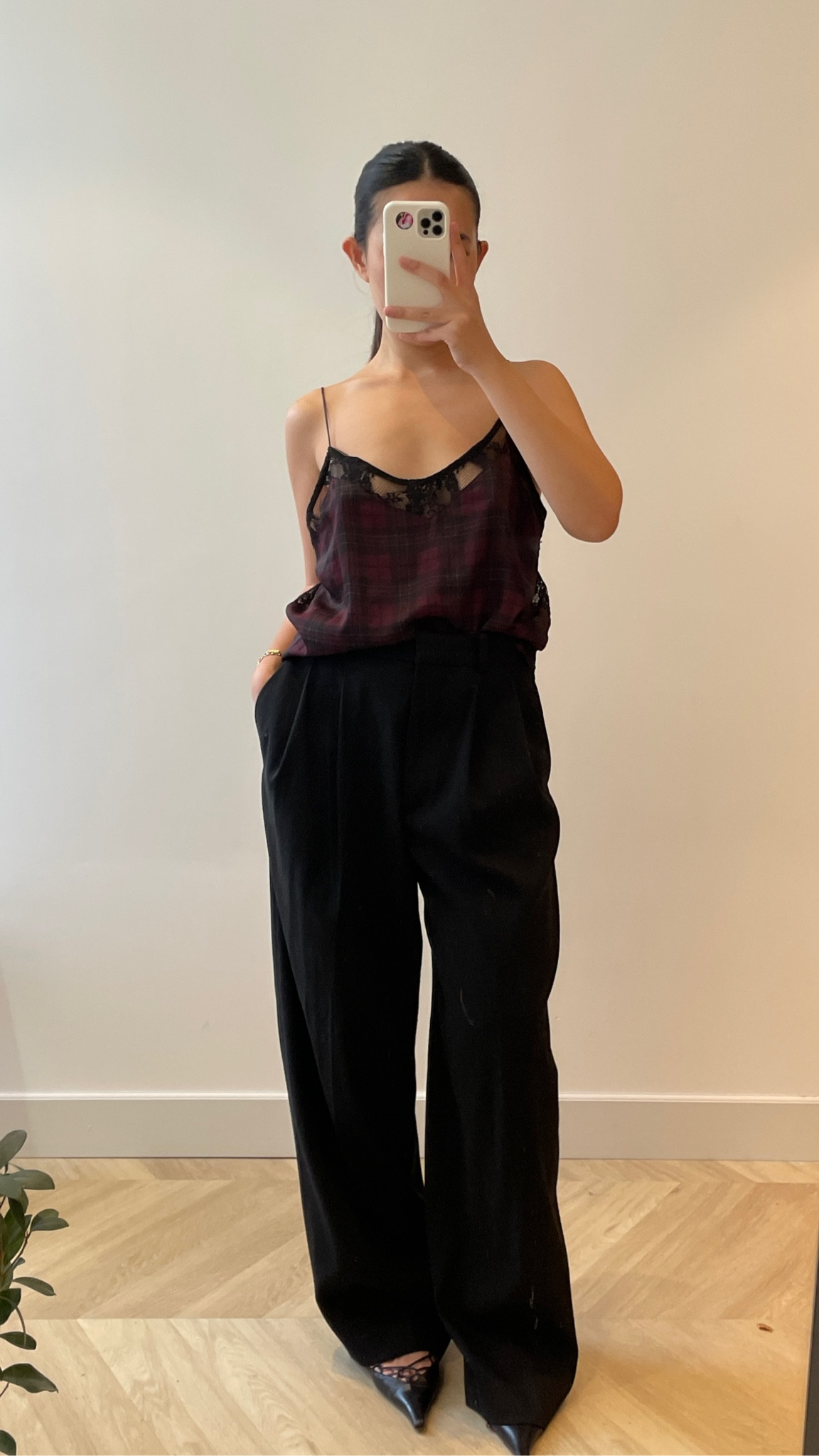 bringing back the silk lace cami that i’ve had for years now and pairing it with tailored wool trousers and kitten mules - it’s my (new) favorite laid back effortless party look 🖤

Nye, new years outfit, house party outfit

#LTKeurope #LTKstyletip #LTKparties