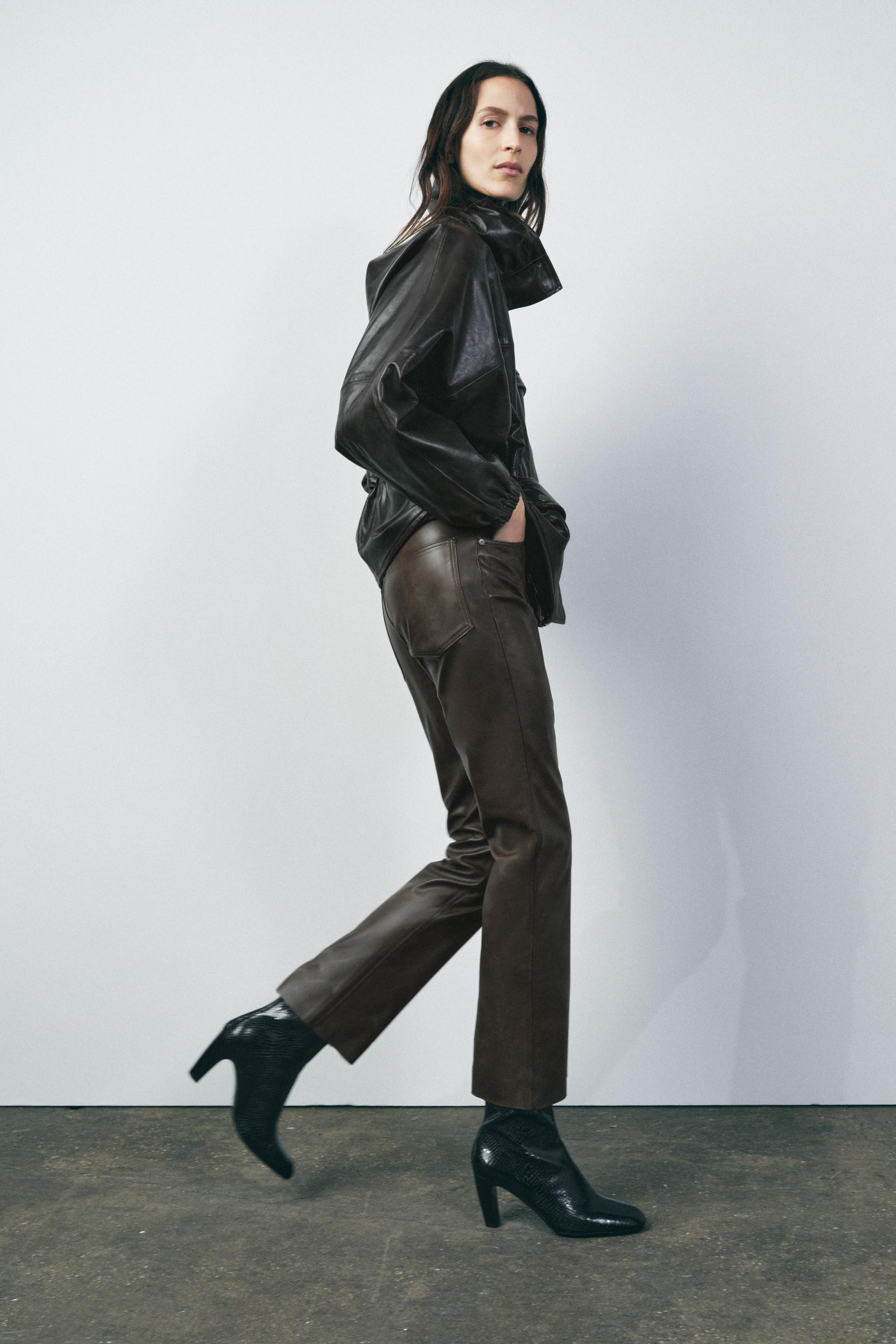 ZARA WOMAN COLLECTIONHigh-waisted pants with belt loops. Five pockets. Seamless hem. Front zip an... | Zara US