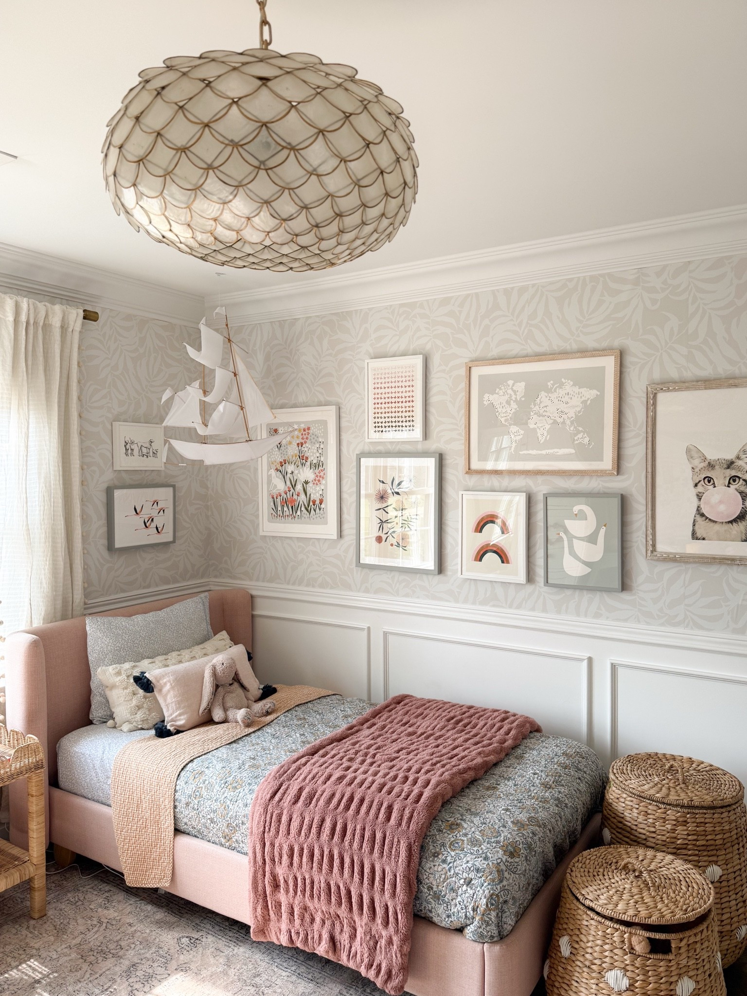 Lighting can completely change the feel of a room, and this shell chandelier is such a beautiful statement piece. I love how the layered texture adds interest while still keeping the space soft and light. 

Girls bedroom lighting, statement chandelier, shell light fixture, layered lighting, kids room decor, neutral home decor, bedroom design, coastal interiors, home lighting ideas, GirlOnTheHudson

#LTKHome #LTKSeasonal