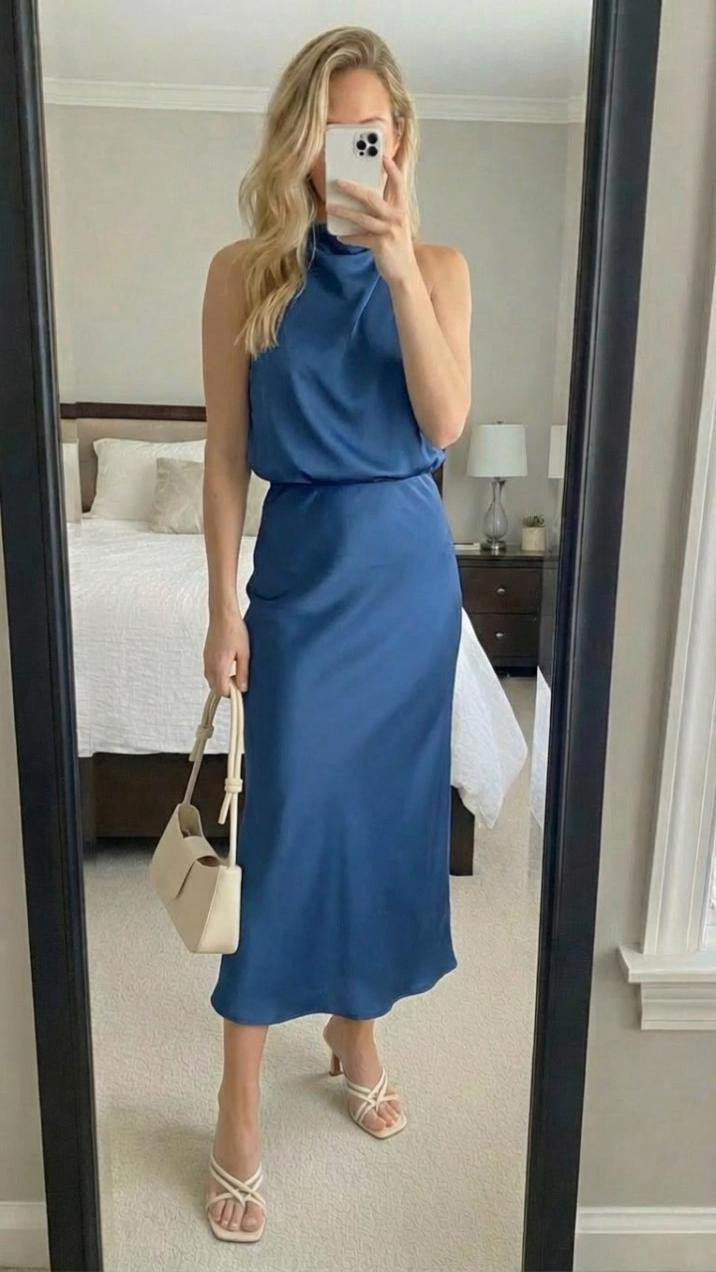 Effortlessly elegant! 💙
This blue halter midi dress is absolutely stunning! The satin fabric, sleek silhouette, and beautiful color make it such a versatile piece for spring and summer!
What I love about this dress:
✨ Gorgeous blue satin fabric
✨ Flattering halter neckline
✨ Elegant midi length
✨ Blouson waist is so flattering
✨ Can dress up or down
✨ Perfect color for the season
The satin fabric drapes beautifully and the halter neck is so chic! The blouson waist creates a flattering silhouette and the midi length is sophisticated and elegant!
Styled it with nude strappy heels and a cream handbag for a polished look. This outfit is perfect for so many occasions!
This dress is ideal for:

Wedding guest
Baby showers
Bridal showers
Date night
Summer events
Garden parties
Cocktail events

Can also style it with sandals for more casual daytime wear! The blue color is so pretty and fresh for spring and summer!
Shop this dress by following me in the LTK app 🛍️ 

 

#LTKWedding
