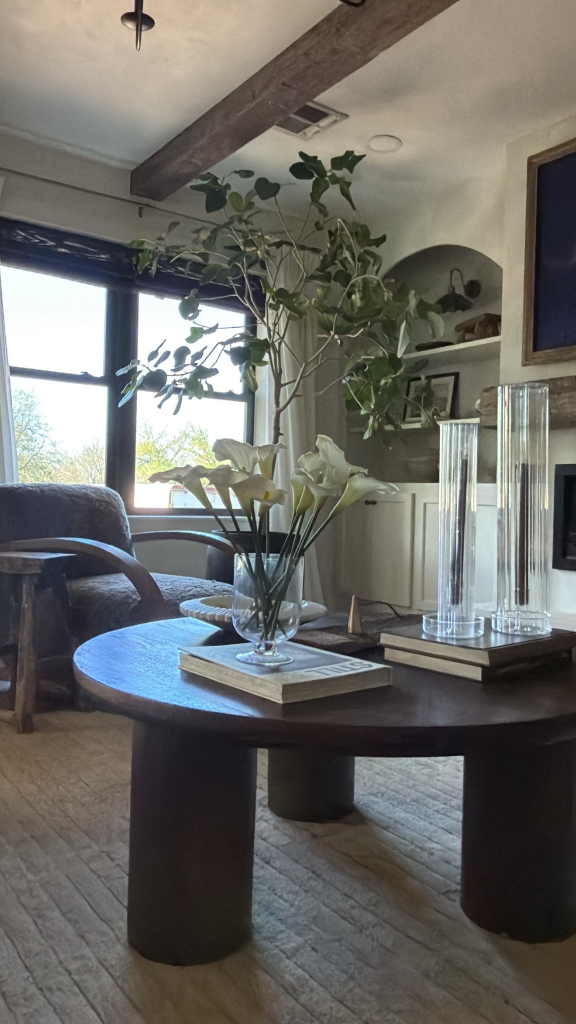 Spring coffee table styling. These faux stems are so pretty and are on Amazon and affordable!! My tree is a live Audrey ficus! 

#LTKSeasonal #LTKmorningroutine #LTKHome