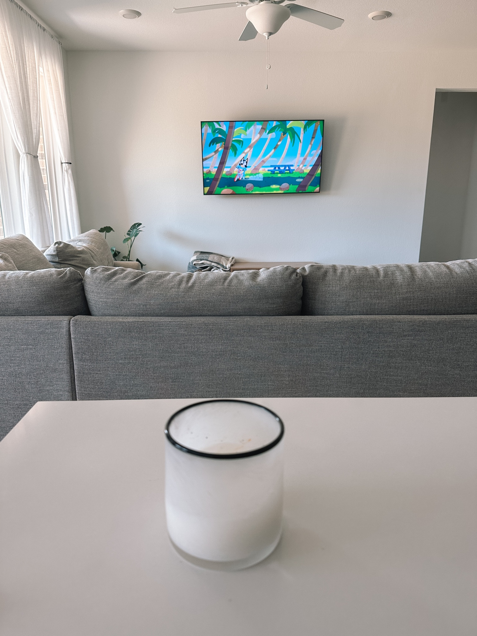 My favorite natural light curtains, tv mount & candle all in one! The hooks for the curtains are also from Amazon! 

#LTKFamily #LTKSaleAlert #LTKHome