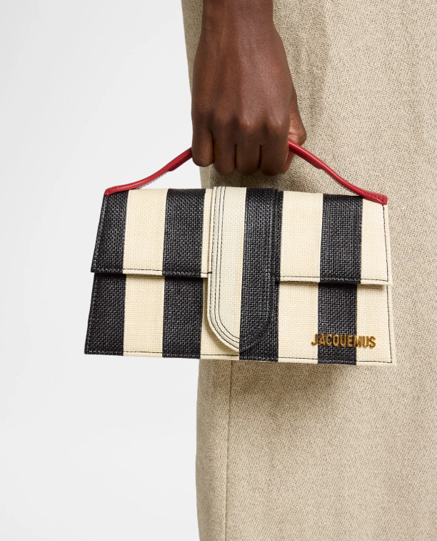 The bag that instantly elevates every outfit ✨ Obsessed with the elegant details and timeless striped design of the Jacquemus Le Grand Bambino Top-Handle Bag . 
Chic, classy, and the perfect statement piece for everyday luxury styling. 🤍👜

A must-have for the fashion girls who love effortless sophistication.

#Jacquemus #LuxuryFashion #DesignerBag #LTKStyle #FashionFinds #ClassyStyle #EverydayLuxury #BagObsession #WardrobeEssentials