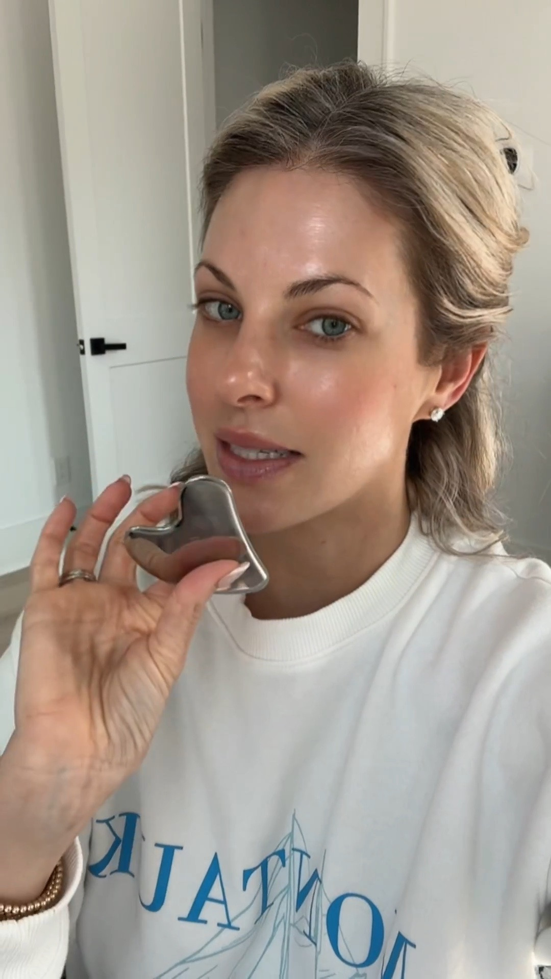 Gua sha = officially a non-negotiable in my self-care routine 🤍✨ If you’re looking for that lifted, sculpted, de-puffed glow without booking a facial every week… this is it.

Consistency is everything—just a few minutes a day helps boost circulation, support lymphatic drainage, reduce puffiness, and give that naturally snatched, contoured look. Think sculpted cheekbones, a defined jawline, and glowy skin from within.

Pro tip: always apply a facial oil or thicker moisturizer before using your gua sha so it glides smoothly across the skin—this prevents tugging and protects your skin barrier. You want to use firm, gentle pressure, but don’t pull or drag too hard. Let the tool do the work while you guide it upward and outward.

Once you start incorporating this into your routine, you’ll understand the hype—it’s one of those small habits that delivers big results over time.

#LTKOver40 #LTKU #LTKselfcare
