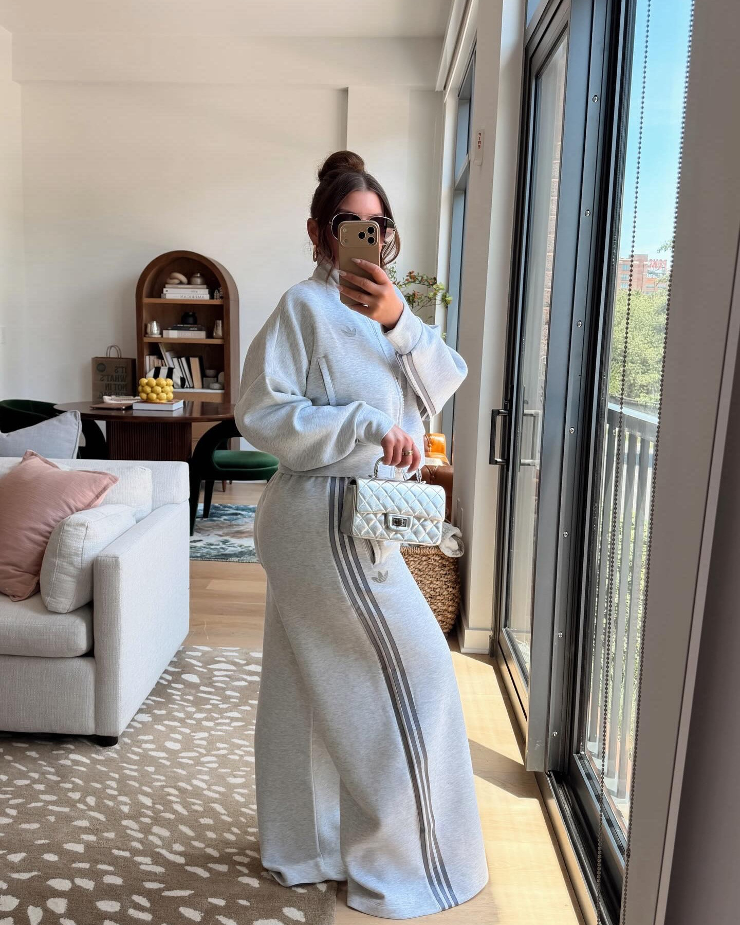 Set Sunday 🥰 LIKE + Comment SET on this post & check your DM for outfit info 🤗 

I found updated versions of our favorite @adidas pant sets and had to share a few of the color options with you.

& this dress?? It’s @nike ! It’s very light weight nylon material. There are so many ways to style it. Boots, heels, sneakers, over denim, over trousers, open as a jacket. Very versatile piece.

I’m 5’4” and all pants have 1-3 inches of extra length.

Wearing true size in all looks. 

Except the grey: sized up in pants, sized down in jacket. That’s my personal fit preference otherwise, it runs true to size.

you can always find everything on my LTK ( @ Julia.Marie.b )

or Tap my bio > find this post on the grid

https://liketk.it/6fT1M