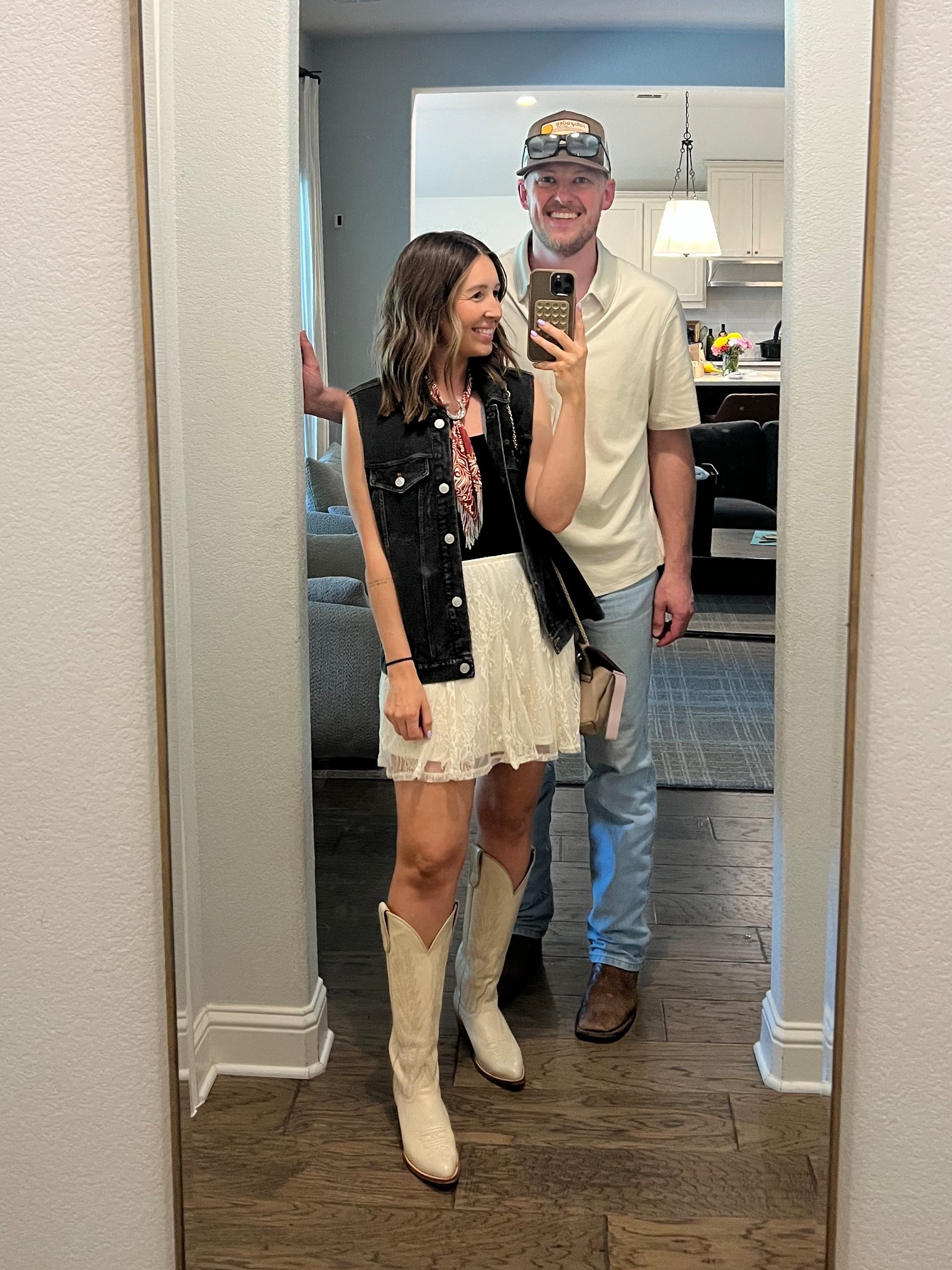 Country concert outfit 🤠 

lace skirt | black denim vest | cream boots | bandana necklacee