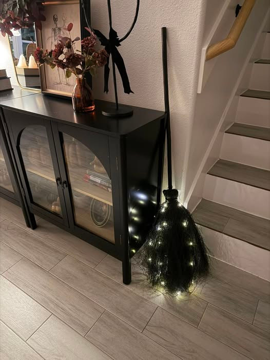 This light-up witch broom is SO cute! 🖤✨ Such an easy way to add a little spooky glow for Halloween! 👻🧹 #LTKHome #LTKFinds #HalloweenDecor #HalloweenFinds #FallDecor 

 
