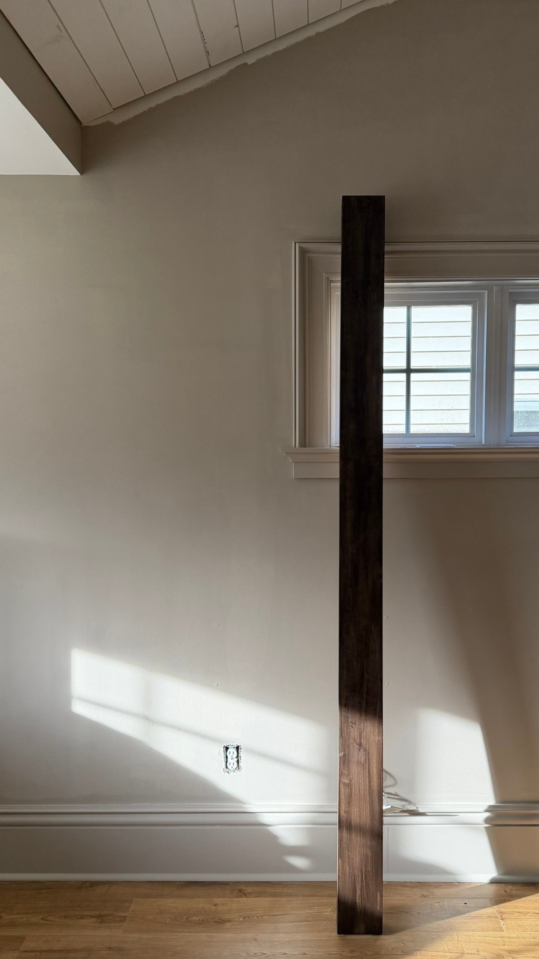 Our wood beam stained and ready to attach to the ceiling 

#LTKHome