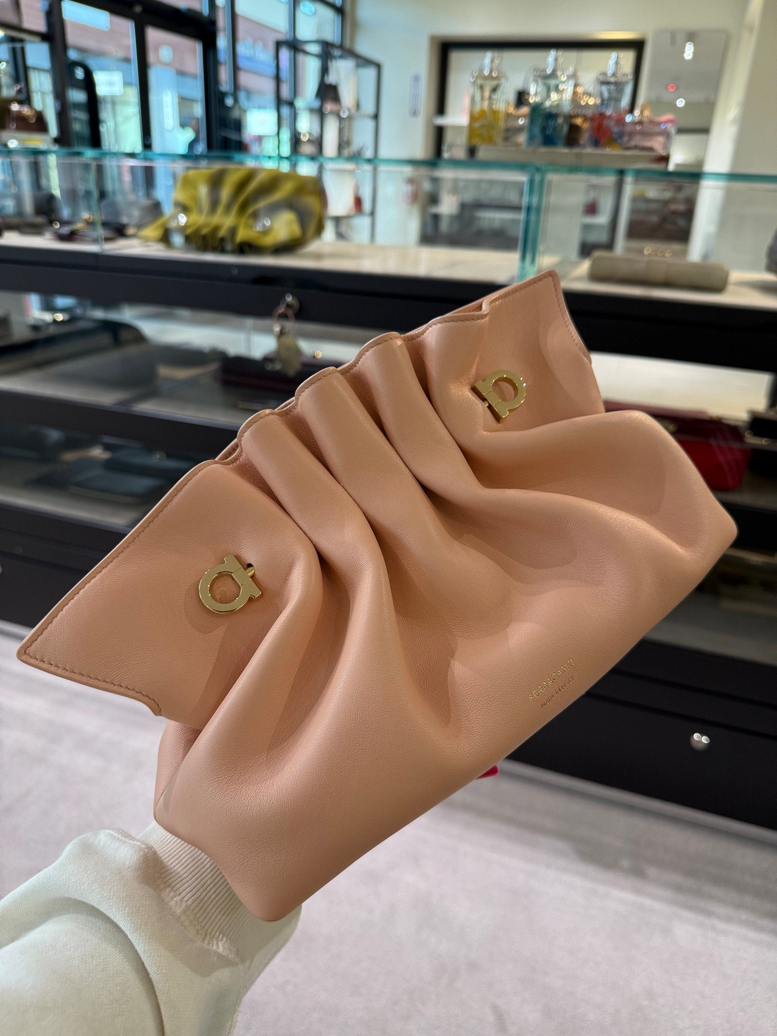 I’m still dreaming about this Ferragamo clutch at saw at the outlet yesterday ☺️ it was half the retail price and that’s a steal. You can also wear her as a cross body and I love it 

#LTKHome #LTKSeasonal