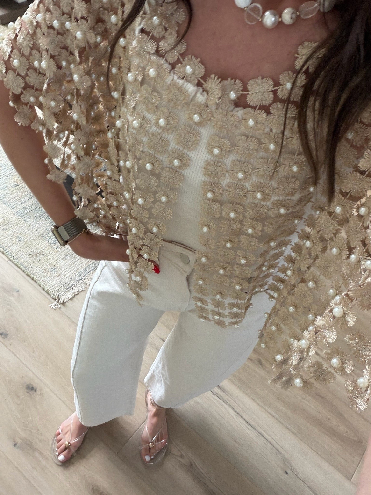 This pearl embellished layer is one of those pieces that makes the whole outfit. I love the dimensional floral texture over a simple tank, and pairing it with white denim keeps the look light while still feeling special.

pearl embellished top, floral lace layer, white denim, statement top, feminine style, textured outfit, dressy casual, date night outfit, special occasion style, layered look, annabrstyle

#LTKootd #LTKTravel #LTKOver40