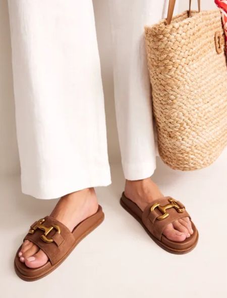 Iris Snaffle Slider Sandals

We love our Iris loafers so much that we couldn’t bear the thought of being without them in the summer months. That’s where these sliders come in. Made from leather, they’re embellished with the classic horse-bit snaffle on the front.

#LTKShoeCrush #LTKWorkwear #LTKStyleTip