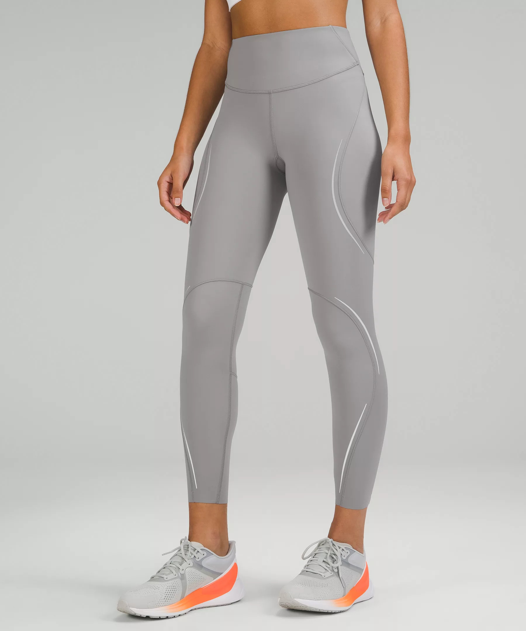 Base Pace High-Rise Reflective Tight 25" | Women's Leggings/Tights | lululemon | Lululemon (US)