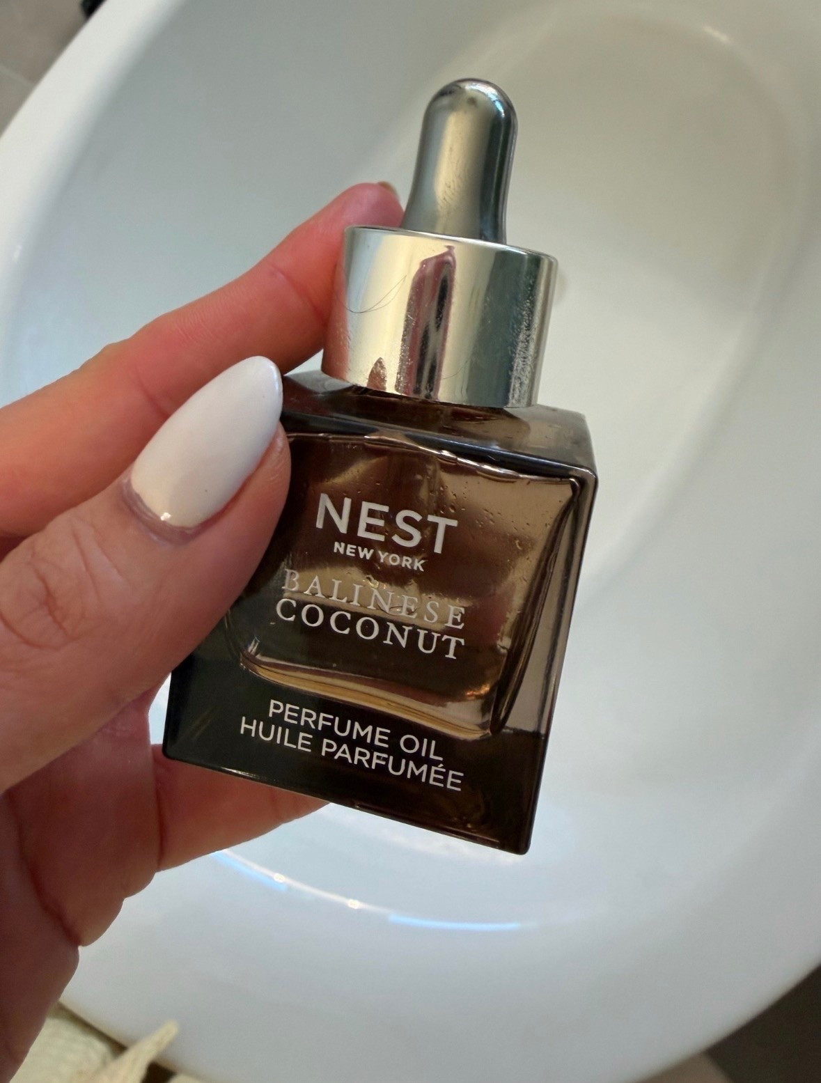 One of my favorite summer scents. This perfume oil lasts all day and smells like a tropical vacation in a bottle with notes of coconut, white florals, and warm vanilla. I always get compliments when I wear it.

Summer fragrance, Perfume oil, Coconut scent, Vacation scent, Tropical fragrance, Beachy perfume, Long lasting fragrance, Beauty favorites, Warm weather essentials, Everyday luxury, Signature scent, Fragrance obsession, annabrstyle

#LTKBeauty #LTKgrwm #LTKOver40
