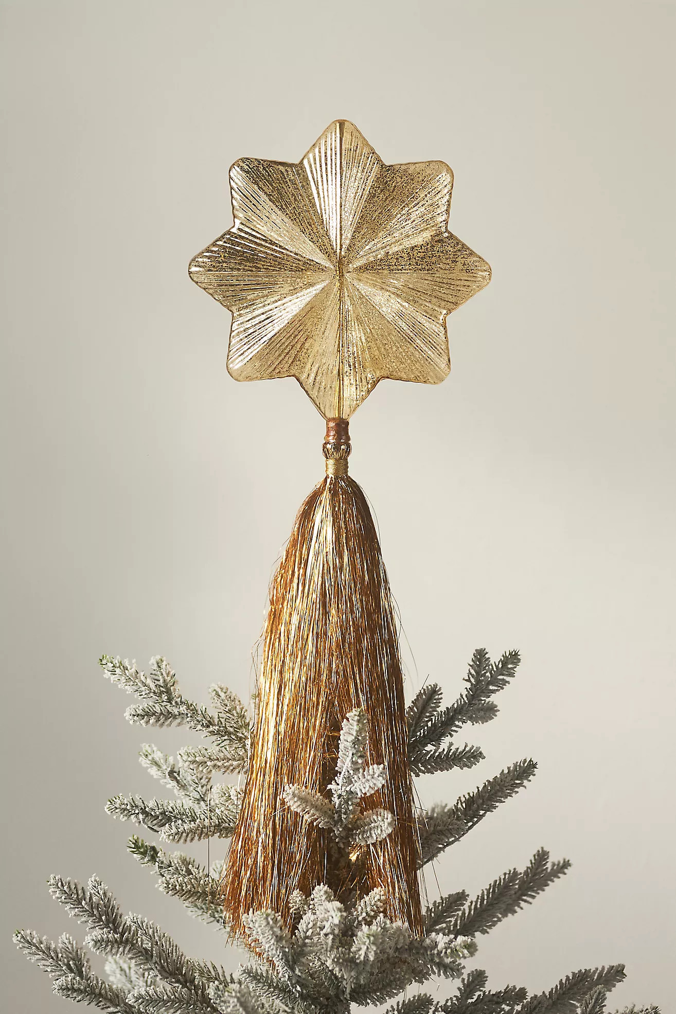 Light-Up Shooting Glass Star Tinsel Tree Topper | Anthropologie (US)