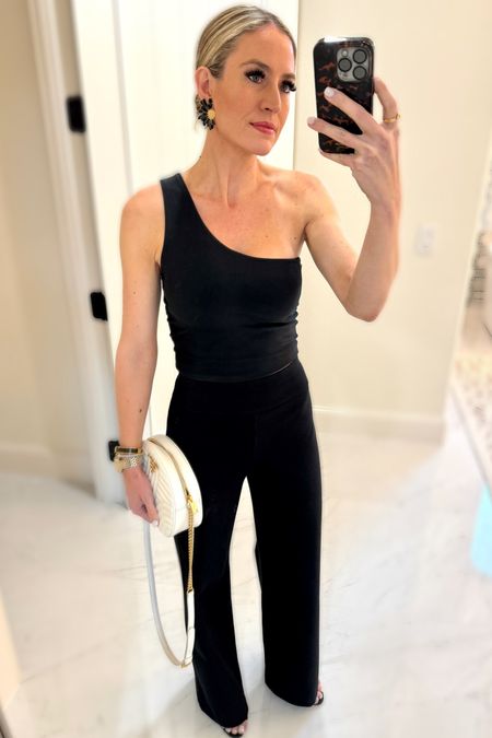 #ootn I sometimes wear work out tops when I dress up. There is no shame in my game. They are not cheap, they are comfortable, and they have a shelf bra!  I always size up in work out tops so that I can get them on and off easier.

There aren’t many sizes left in my favorite slacks but keep and eye out for them to be restocked!! I also own them in sand-shell (see my other posts) and they are not see through! 

I receive compliments every time I wear these earrings. 🔥 They come in multiple color options!

#everypiecefits

#LTKstyletip #LTKSeasonal #LTKover40