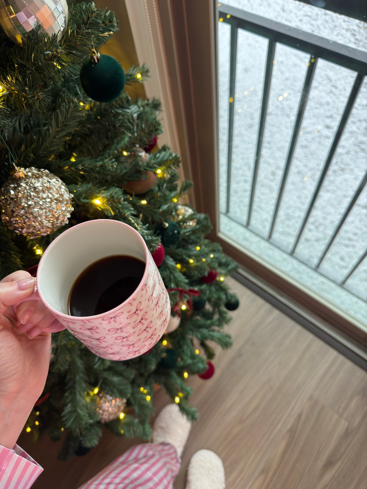 Christmas tree lights are on. Snow is falling. Cozy pajamas with coffee in hand 💗☕️

#LTKSeasonal #LTKFindsUnder50 #LTKHoliday