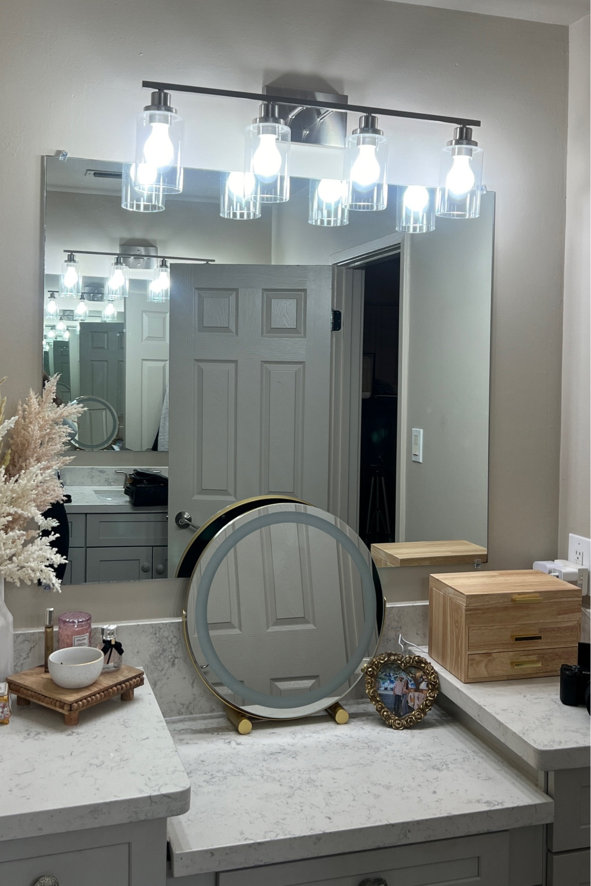 upgraded our master bathroom to have this light up vanity mirror from Amazon & im OBSESSED with it! Currently on sale - has warm white light, white light, & warm light options. I love that you just plug it in so I don’t have to worry about charging it like my previous vanity mirror. It’s the perfect size & makes it to where I can actually see all of my face when doing my makeup/hair since my stool is low and the wall mirror doesn’t go all the way down.

#LTKsalealert #LTKfindsunder50 #LTKhome