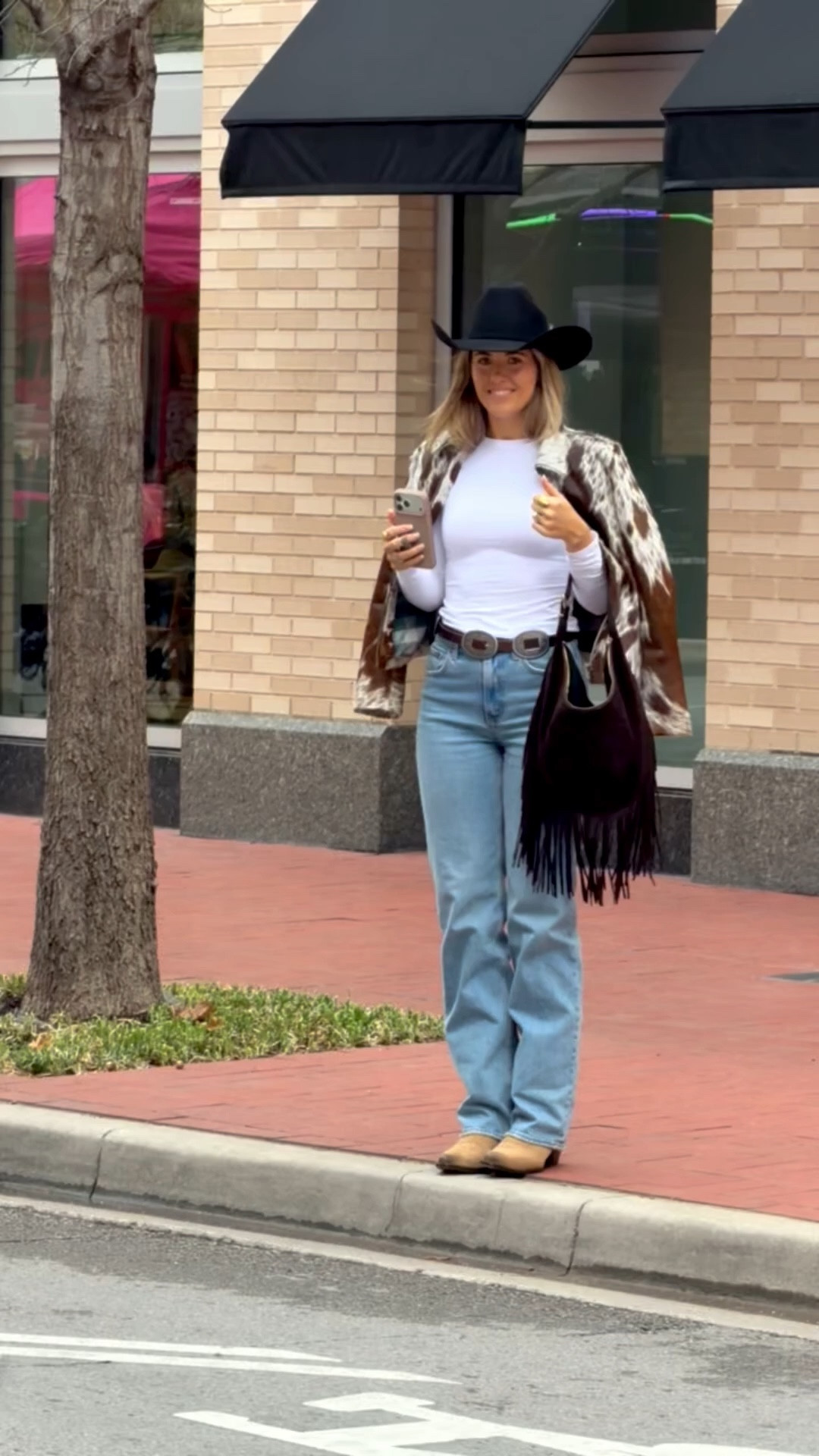 size 26 extra tall in jeans, small in long sleeve, cowhide jacket is a custom size but when you measure i suggest giving yourself some extra room or you can order a standard size! size XS in belt and size down half size in boots 

#LTKTall #LTKootd #LTKFestival