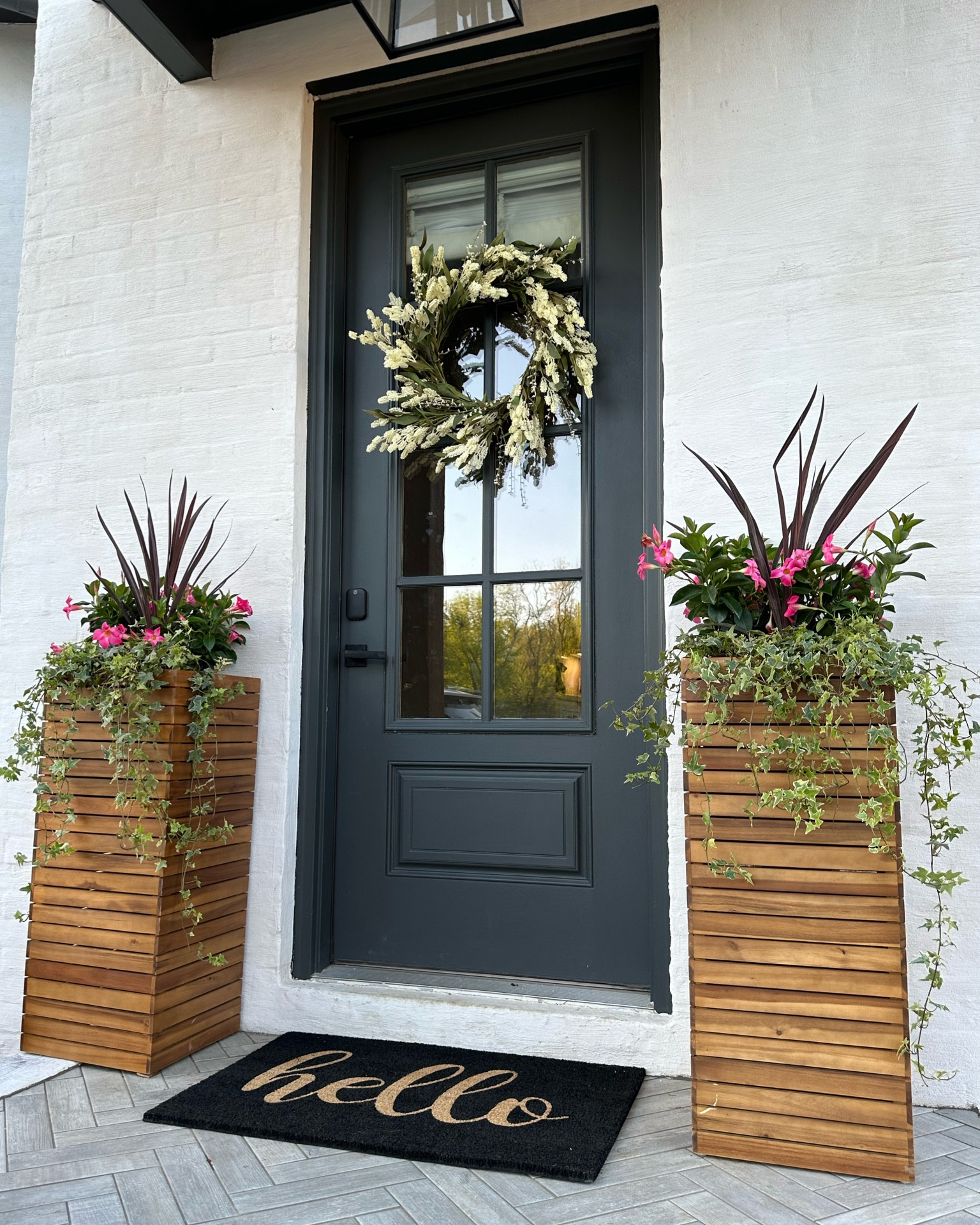 Front porch spring decor is my favorite! I love these planters! #planters #spring #frontporch #homedecor #wreath

#LTKSeasonal #LTKstyletip #LTKhome