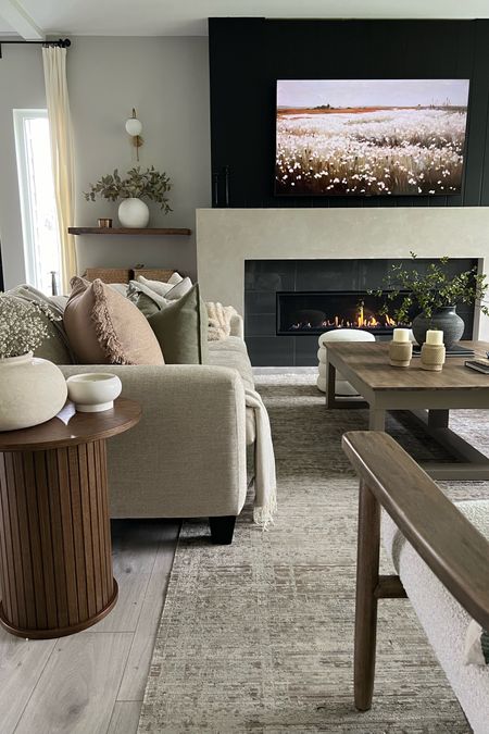 Warm, neutral and cozy! My number one tip for adding warmth to a space: wood furniture! 
I’m loving the mid-tone wood of my accent table! 
Living room inspiration 

#LTKhome