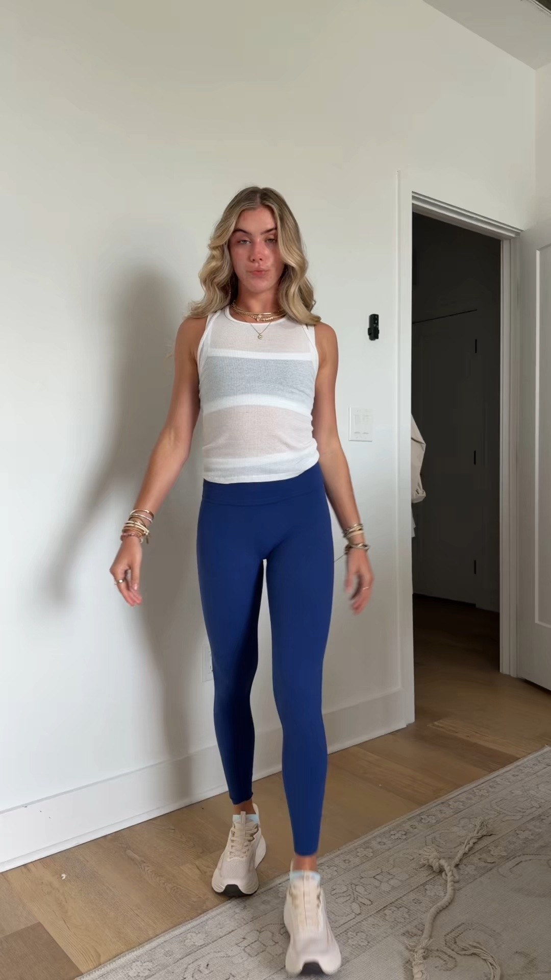 Monday outfit. I’m wearing my favorite @abercrombie YPB studioFLEX cami sports bra and stuidoflex leggings size xs. I layer these Hanes boys tank tops for a sheer tank size large. My necklaces are all @electricpicks and my sneakers I just got from Amazon they are like a look for less for my APL & Hooka sneakers. My socks are @closemate.