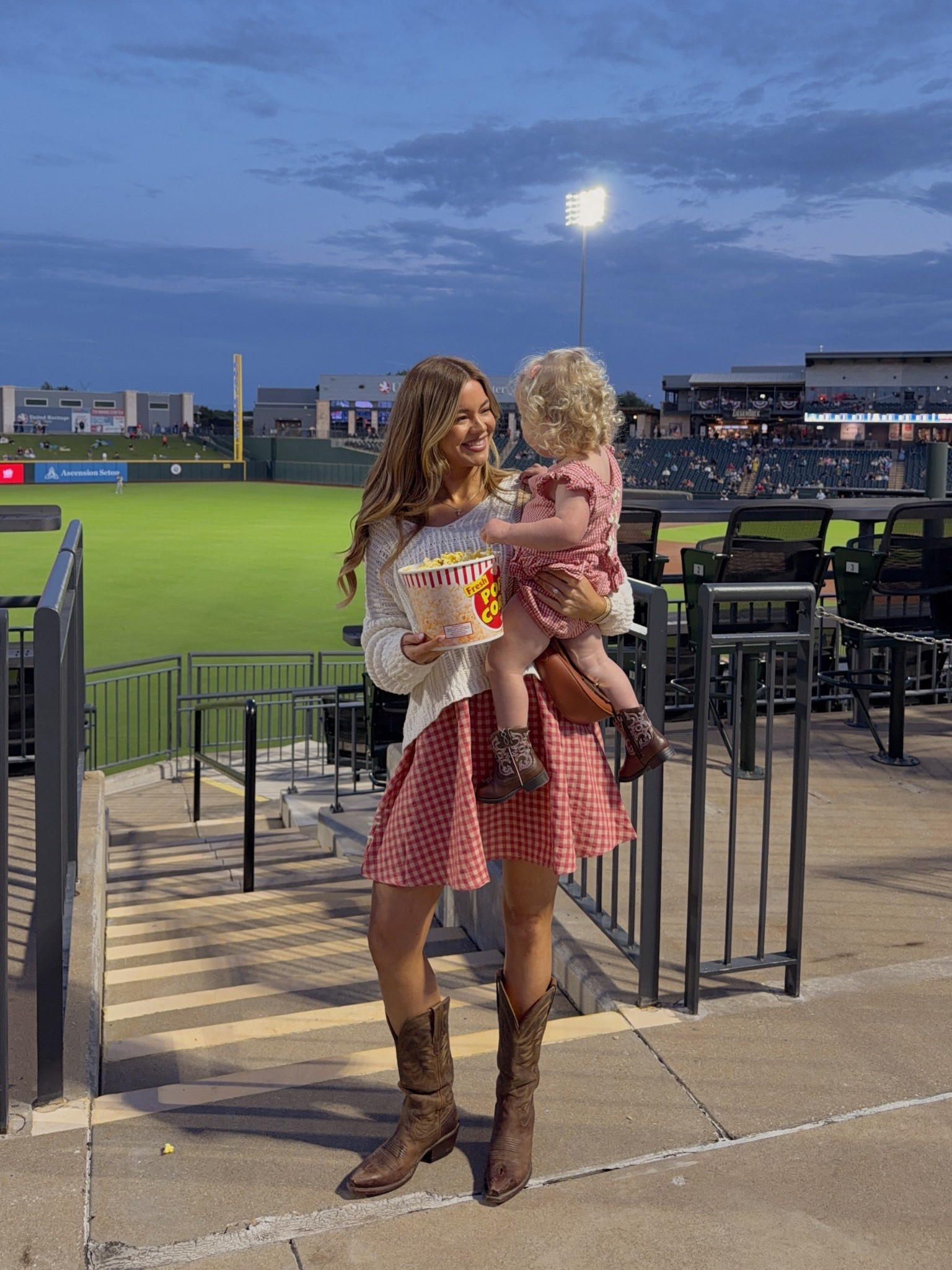 me & lucy’s baseball outfits! i’m wearing an xs in my a dress (code: MICHELEJ40 until 4/13) and xs in my white sweater— (linked similars) exact one is from pink lily, but old! code MICHELE works on the pink lily website tho 🫶🏼