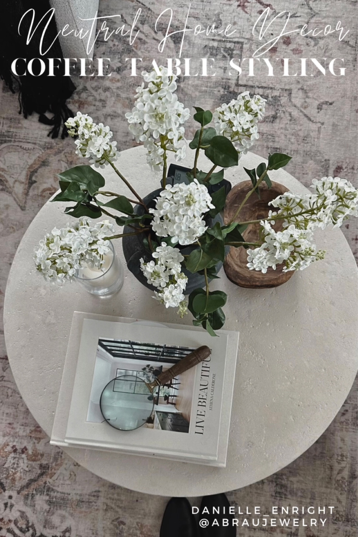 Neutral living room coffee table styling 🤍 

🏷️ neutral home decor , neutral living room , round coffee table , lava stone coffee table , small coffee table , coffee table books , coffee table style , vase , wood bowl 