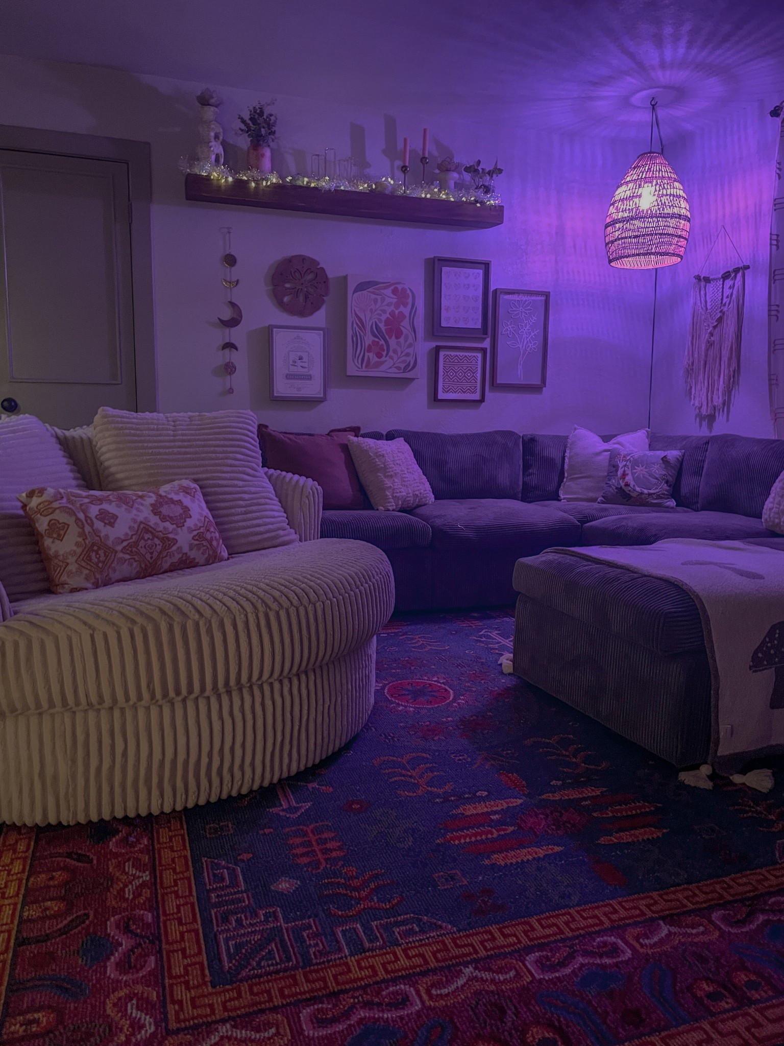 Cozy Boho Living Room Goals ✨ Loving how this moody, maximalist setup brings all the warm vibes—from the plush corduroy swivel chair and textured sectional to the purple pendant lighting and curated gallery wall. Every accent pillow, wall shelf styling, and statement piece is shoppable below!

Shop my look ⬇️
🛋️ Cozy Boho Living Room Decor
🌿 Maximalist Home Styling
💡 Accent Lighting & Statement Pieces
🖼️ Gallery Wall Art & Shelf Styling#cozydecor #bohochic #maximalistdecor #livingroominspo #affiliatelinks #shopmyhome

#LTKHome #LTKHome
