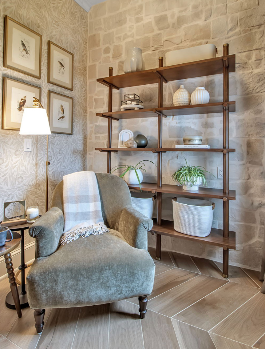 Save this if you’re trying to make a corner of your home feel instantly more elevated.

Designers always create one styled moment in a room that pulls everything together. This reading nook does exactly that. A warm brass floor lamp creates soft ambient lighting, rich wood shelving adds height and structure, layered ceramics and vessels bring texture, and greenery softens the entire space. Add a cozy chair and suddenly this corner becomes a quiet retreat.

This is the kind of setup that makes a home feel intentional, calm, and quietly luxurious without redesigning the whole room.

Shop this styled reading nook including the shelving unit, brass floor lamp, cozy chair, decor pieces, planters, and textiles through my LTK.

#AmandaAndCoDesign
#InteriorDesign
#HomeStyling 

 #LTKdayinmylife #LTKselfcare #LTKHome