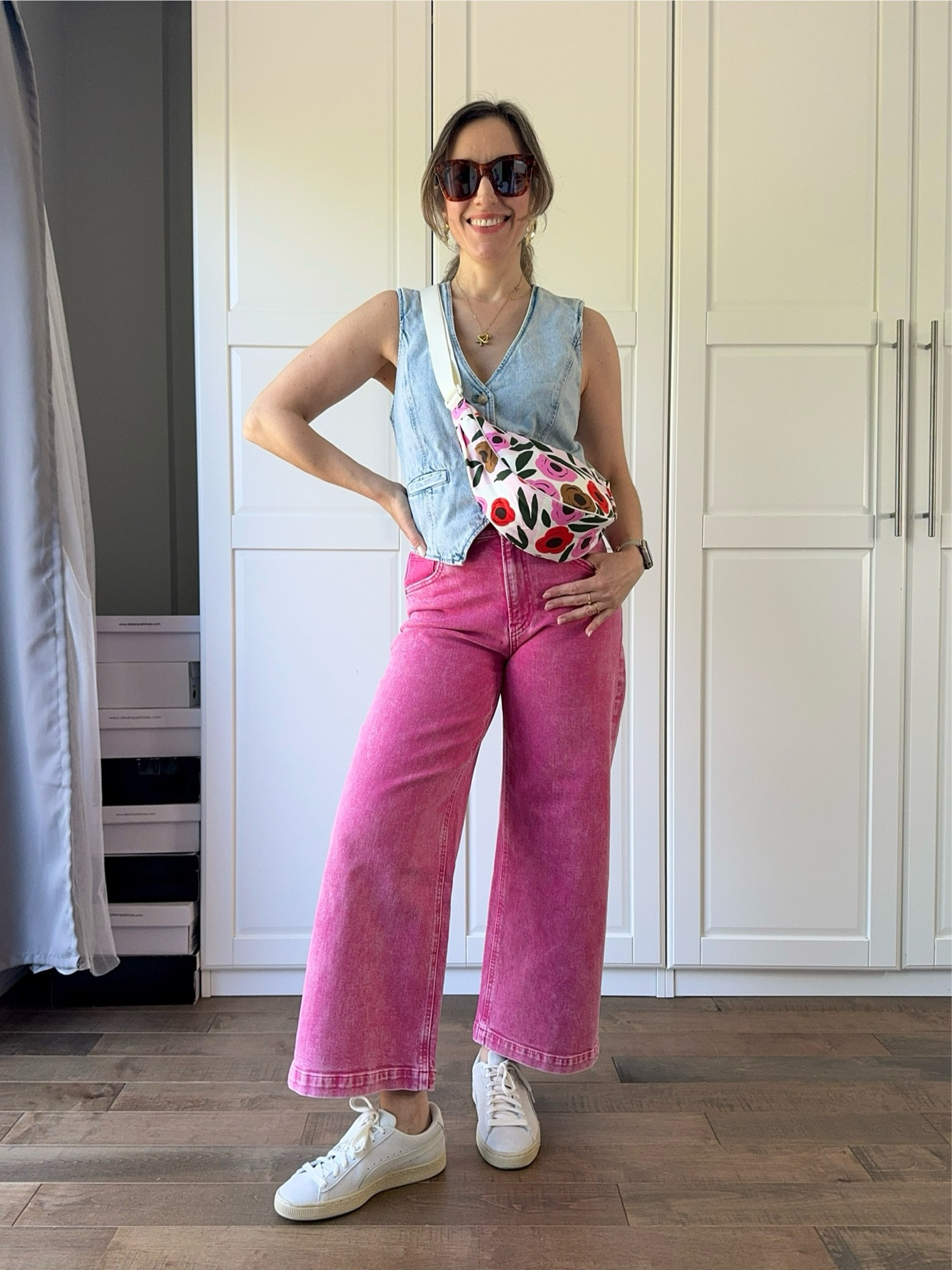 Denim on denim done a bit different!  Pink wide leg jeans with a light denim vest, white sneakers and colorful sling bag. 

Pink pants, pink jeans, how to wear cropped wide leg jeans. Puma classic suede, colorful sling purse,    Pink outfit, colorful outfit, colorful styles 

#LTKFindsUnder50 #LTKOver40