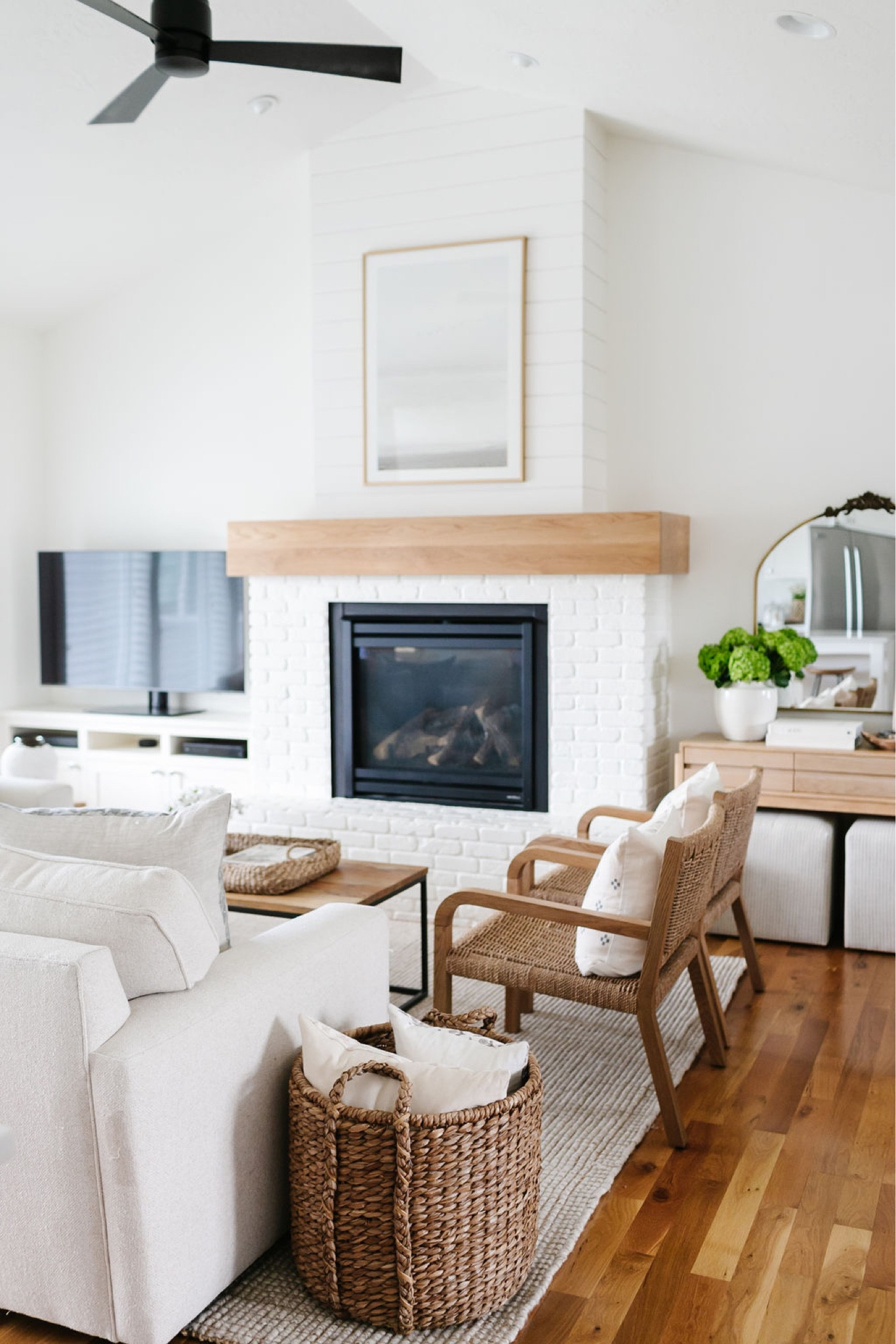 I love adding warmth to a living room with items such a woven chairs, baskets and a cozy rug  

#LTKstyletip #LTKhome #LTKFind