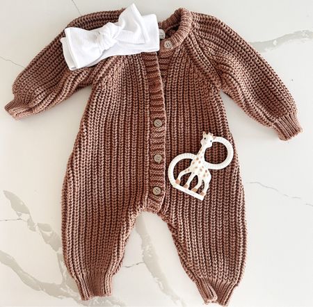 Fall and winter baby outfit that would be perfect for baby girl or boy. Chunky knit jumpsuit is on sale for 30% off and bow is on sale for 20%

#LTKbaby #LTKsalealert #LTKCyberWeek