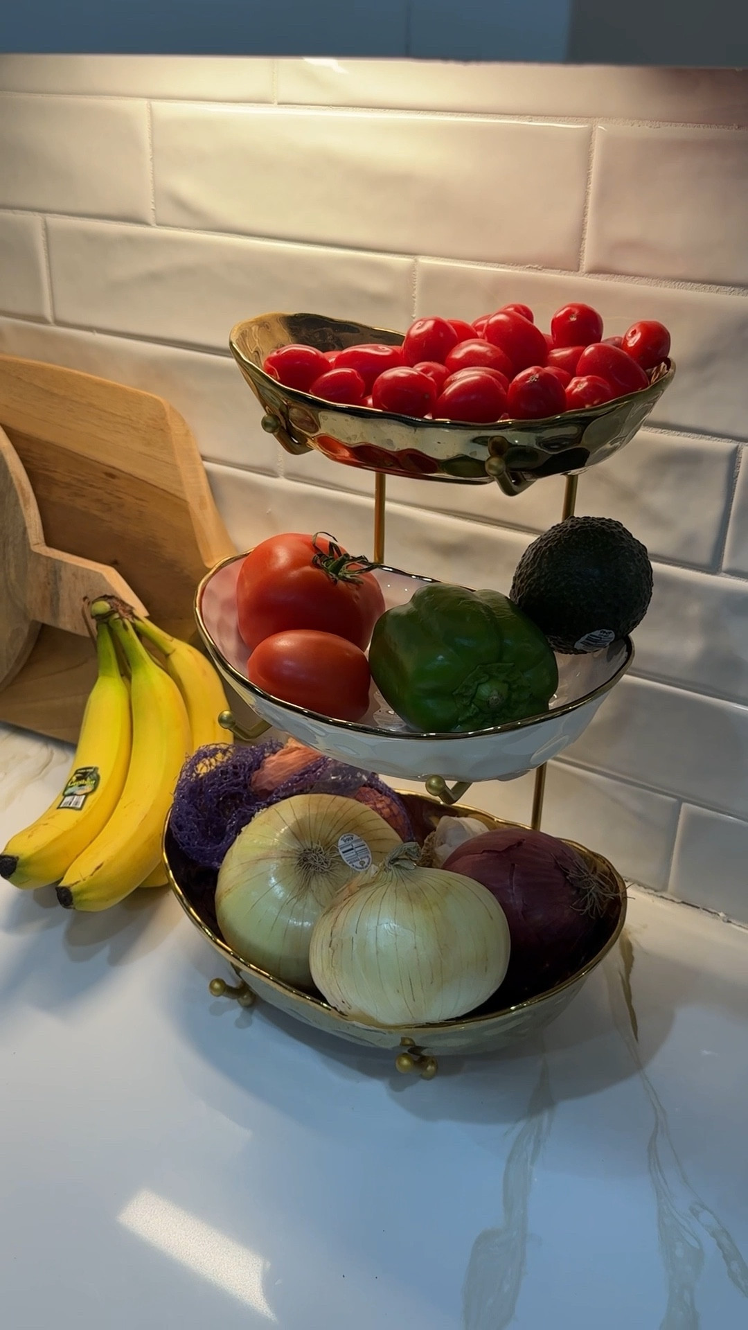 One of those simple kitchen upgrades that makes the counter feel more organized, this tiered fruit & veggie bowl has been so practical for us! 

#LTKfoodie #LTKFindsUnder50 #LTKHome