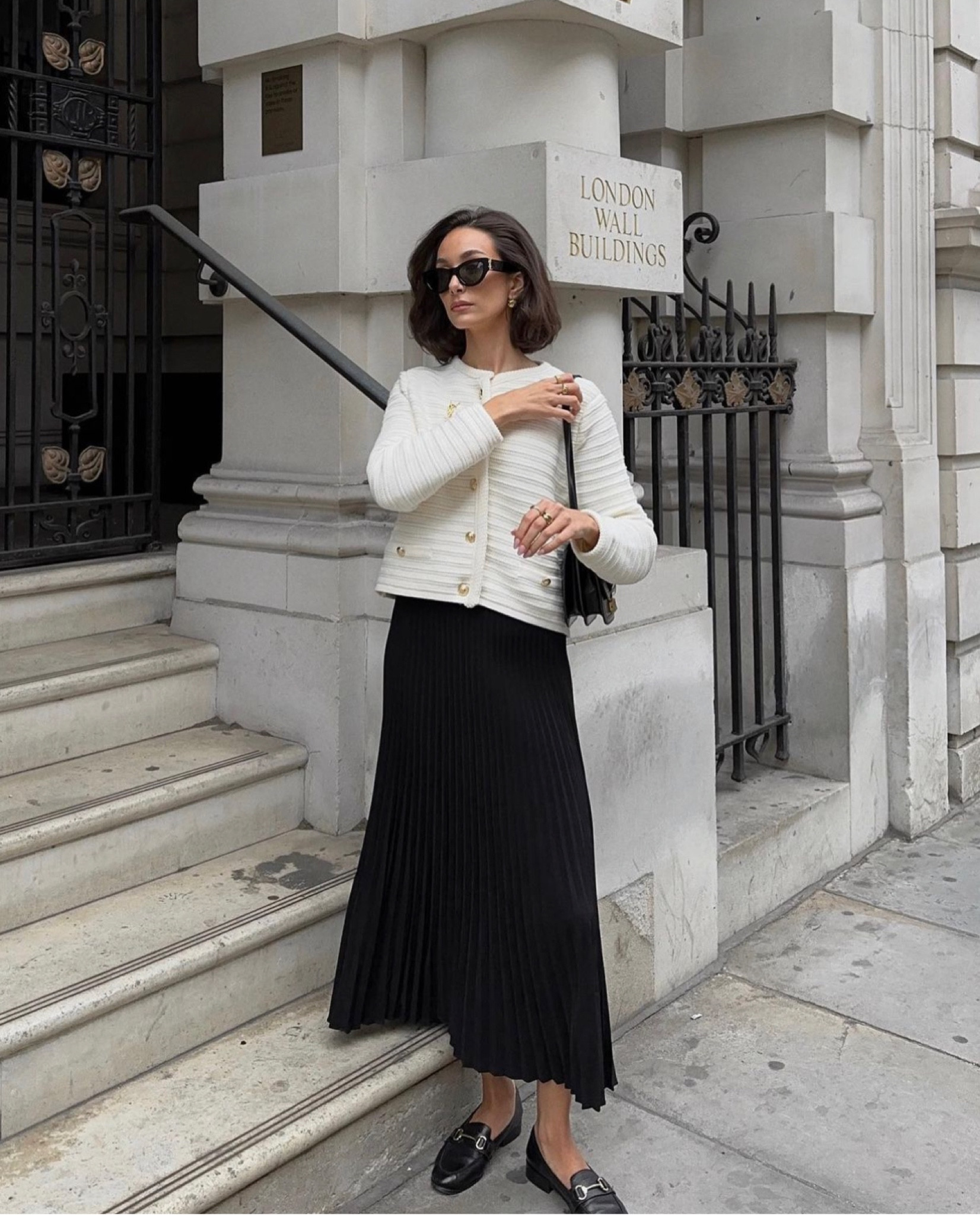 Textured white jacket, light jacket, black skirt, loafers, YSL brooch, YSL sunglasses, monochrome outfit, autumn jacket, autumn outfit, black and white outfit, black accessories, classic style 

#LTKeurope #LTKSeasonal #LTKstyletip