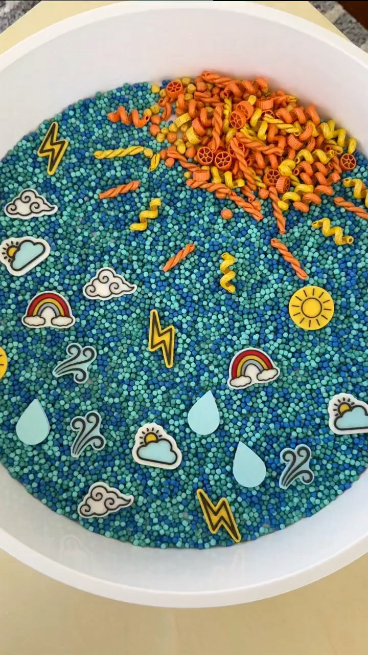 This weather themed sensory play setup was such a hit 

🤍 We used @hippiehooray filler for the sky and sun, and mixed in 3D weather pieces from our @learners_in_bloom March box designed for hands on learning & play. Put it all in our @inspiremyplay play tray

It’s simple, engaging, and SO satisfying to pour and play 😍

Tell me your favorite season👇

✨ Follow @kenzs.kitchennn for real toddler life, simple activities, and hacks every mom needs.

#sensoryplay #toddleractivities #weatheractivities #finemotorskills #playtrayideas 

toddler sensory bin, sensory play at home, easy toddler activities at home, fine motor activities toddler, twin toddler life, busy toddler ideas, satisfying sensory play, screen free toddler ideas

#LTKmomlife #LTKKids